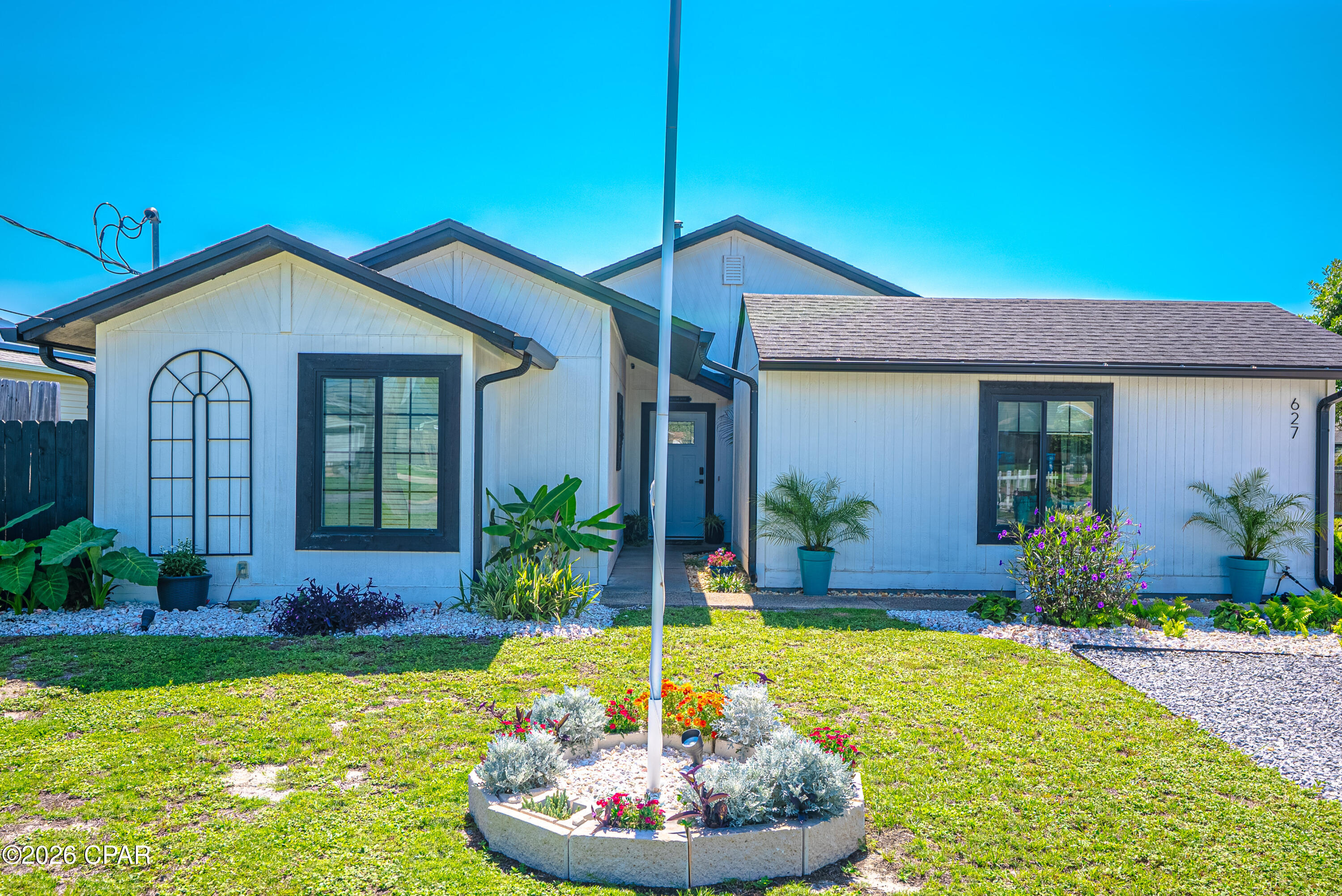 Beautifully designed 3 bedroom 2 bath home offering the perfect blend of comfort and coastal charm . Enjoy peaceful bayou views from your backyard oaisis complete with pool, spa and out side shower. Great space for relaxing or entertaining your guests. Inside you will find a wonderful floor plan featuring an additional living area ,All freshly painted  and a stylish coffee bar that creates the perfect spot to start your mornings or unwind in the evening . The home features a newer tankless water heater installed in  2021 and roof installed  in 2019 .  The landscaped area around the home gives a comfort feeling you have to see to appreciate . The kitchen has been updated with top of the line refrigerator & counter top space,   beautifully done and ready for your family dinners with a  wonderful dinning area just steps away . Both living rooms has a large sliding door one leading out to the backyard oasis and the other leading out to a beautifully landscaped patio on the side of the home close to the spa area . Nice workshop/ shed located outside for all your projects.  This home is a must see call your realtor today to schedule a private tour!!