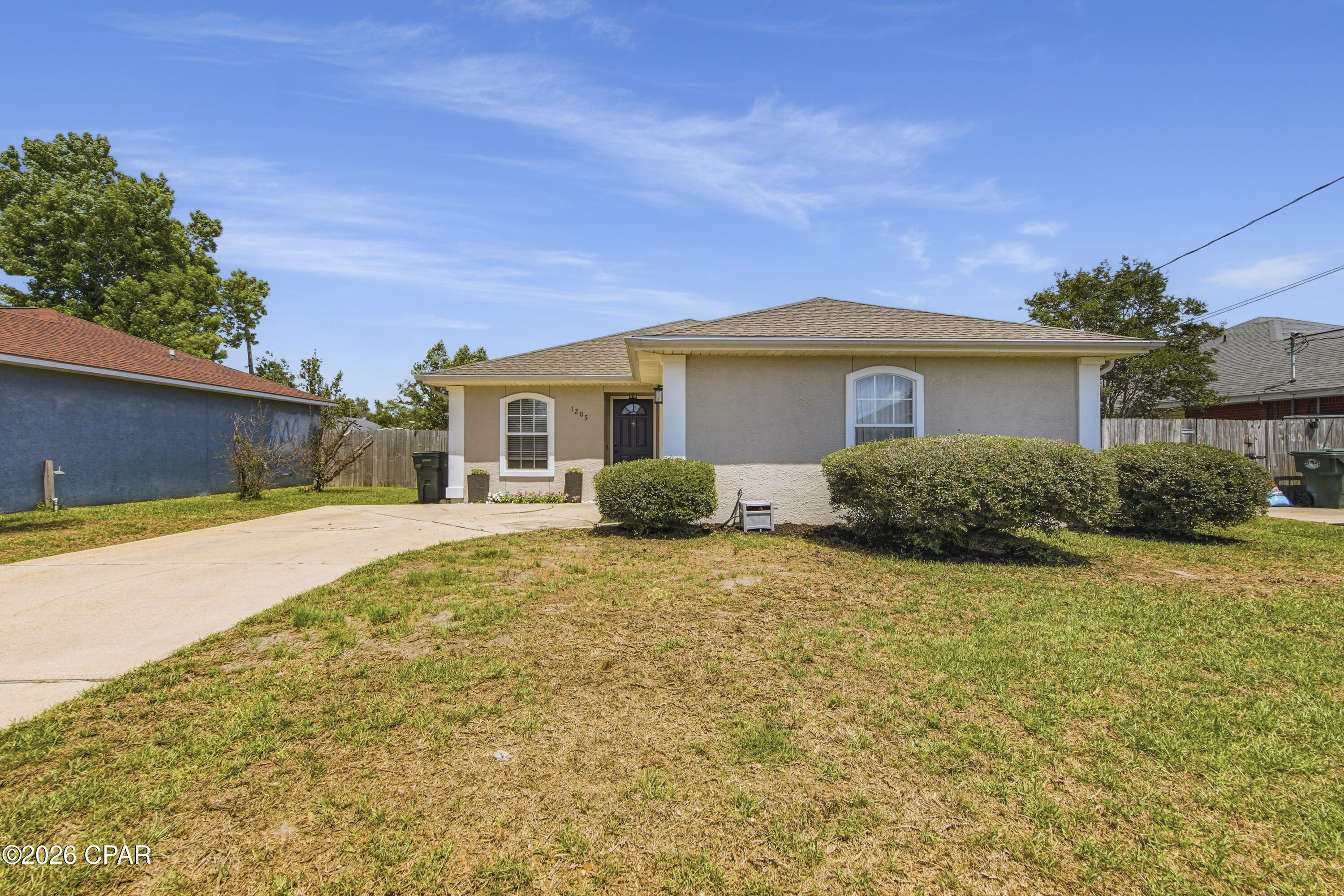 UNBELIEVABLE OPPORTUNITY to live in this popular Lynn Haven neighborhood at an amazing price!  The home features a good-size living room, a kitchen with granite countertops, stainless-steel appliances, tiled backsplash and a large breakfast bar open to the eat-in dining area.  This dining area has attractive shiplap walls and offers easy access to the fenced backyard with a  brand-new shed.  The Master bedroom has a Master bath with a shower/tub combination and a spacious walk-in closet.  Down the hall
you will find two additional bedrooms, a guest bath, utility closet with added storage shelves and the door to the over-sized one-car garage,where you will find the washer and dryer that is included in the sale!  If you are a first-time homeowner or simply need to downsize, this is the home for you!
