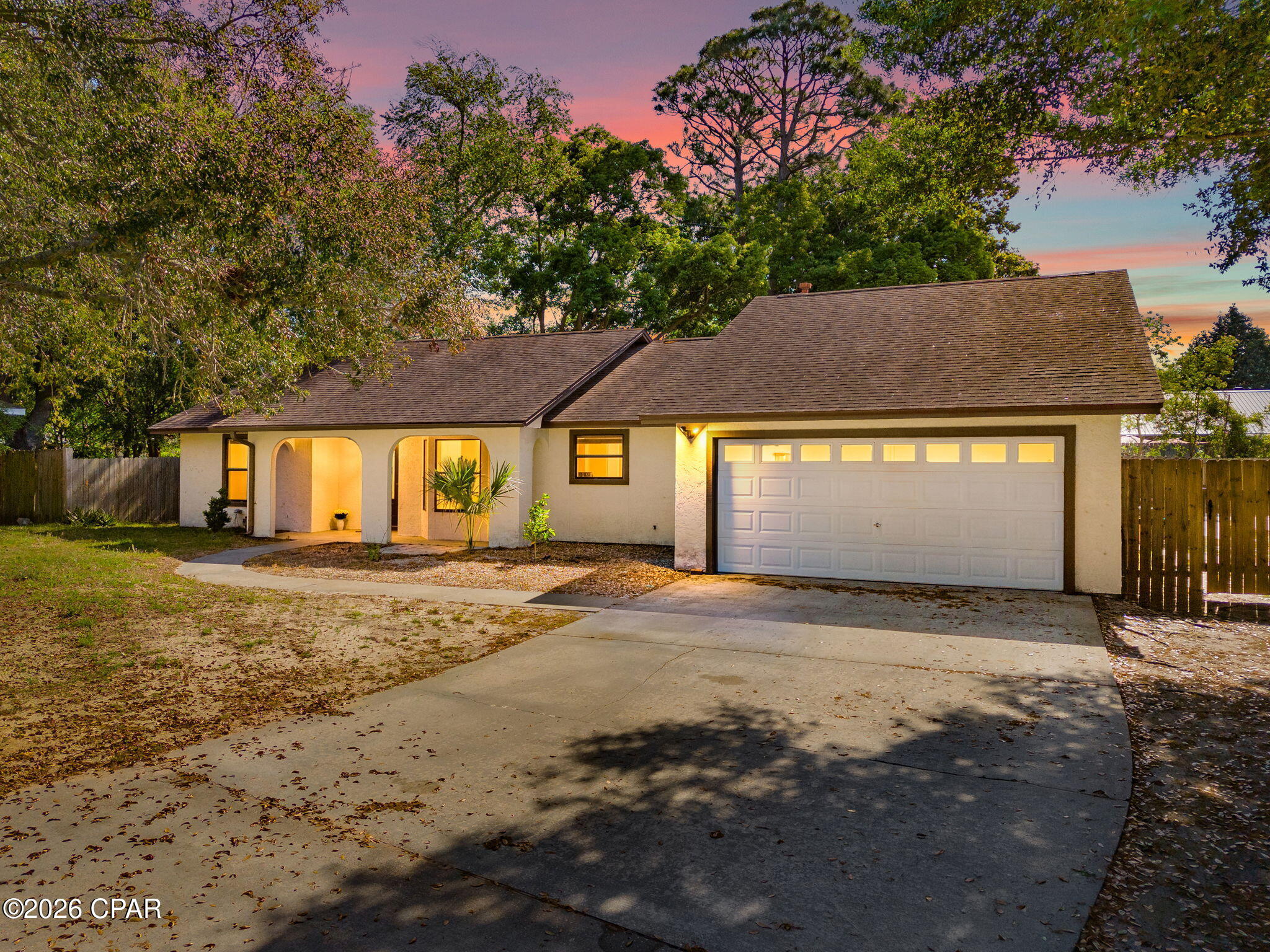 SELLER WILL PAY $5,000.00 TOWARDS BUYERS CLOSING COSTS! 
NO HOA AND MOVE IN READY! 
Discover your perfect beachside retreat in Panama City Beach! This beautiful pool home is in an ESTABLISHED BEACH NEIGHBORHOOD is ideally located just minutes from the World's most beautiful beaches, where sugar-white sand and emerald-green waters await.  Enjoy effortless access to St. Andrews State Park for world-class snorkeling, fishing, boating, camping or hiking on pristine nature trails. Military families will love the short commute to the nearby Navy base, while investors will appreciate the strong short-term rental potential in this high-demand tourist destination. Just a quick drive from popular attractions like Pier Park, Ripley's, Wonder Works and countless dining and entertainment options, this home offers the ultimate blend of relaxation and convenience.

This 3-bedroom, 2-bath split-plan home does NOT require flood insurance and has NO HOA, giving you maximum freedom and lower costs. Recent updates include fresh paint, new carpeting, and a new laundry room addition. The home sits back from the street, providing a spacious driveway for plenty of parking and added privacy.
Step inside to a welcoming open-concept layout featuring a large great room with vaulted ceilings, a corner fireplace, and sliding doors that open to the Florida room. The adjoining kitchen offers a spacious wrap-around counter, cooktop with new microwave, built-in oven, three-basin porcelain sink with disposal and a convenient breakfast/dining area. Ceramic tile flows through the common areas, while the bedrooms feature new wall-to-wall carpet (in two) and laminate flooring (in the front bedroom). The oversized master suite boasts a vaulted ceiling, new carpeting, dual walk-in closets, and direct access to the Florida room. The master bath connects to the brand-new laundry room (with stylish barn door) and offers pass-through access to the pool area. Two additional bedrooms and a full bath with acrylic tub/shower combo complete the split-plan design -- ideal for families or guests.
The highlight? The screened 12x30 Florida room overlooks your private, in-ground full-sized Gunite saltwater pool (recently refinished) and surrounded by a concrete deck. A wood privacy fence, a yard building, and plenty of space for outdoor entertaining or relaxation finish the backyard space. 
Additional recent upgrades include a new septic drain field, a two-year-old water heater, and a 6-year-old dimensional shingle roof -- giving you peace of mind for years to come. The home also has a paid transferrable pest inspection and home warranty in effect. 
Whether you're seeking a permanent residence, a seasonal vacation home, or a high-potential short-term rental investment in this strong tourist market, this move-in-ready pool home delivers comfort, convenience, and excellent income potential.
Ready to experience Florida coastal living at its best? Contact today to schedule a private showing!