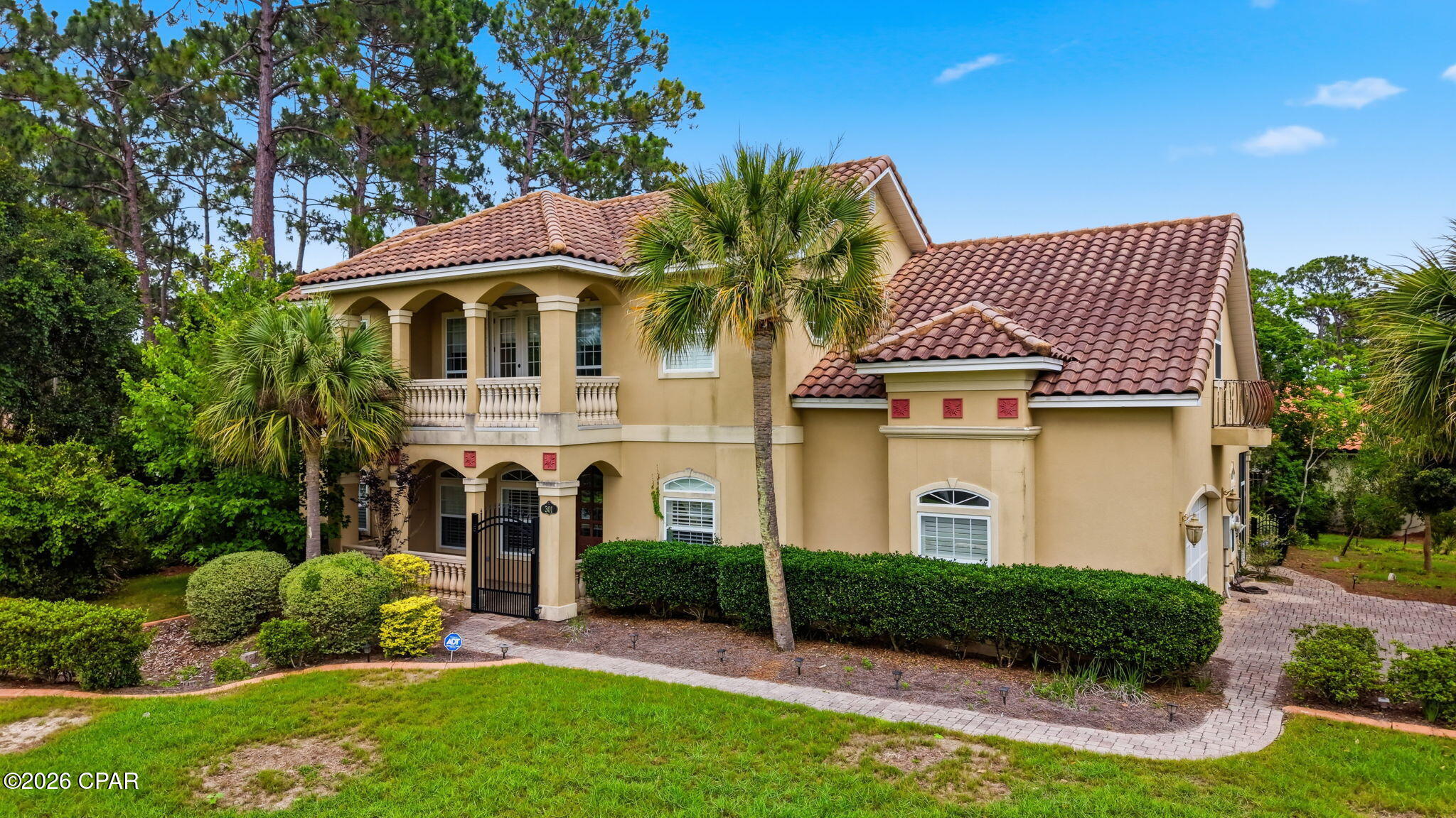 Trieste has demonstrated strong luxury resale value, with previous sales between 304.00 and 505.00  per square foot. This makes the property especially compelling for a buyer, investor, or luxury renovation specialist looking for a value-add opportunity in a gated Panama City Beach community where renovated homes have supported substantially higher values., , y. Luxury value-add opportunity in Trieste, one of Panama City Beach's most private and upscale gated communities, ideally located between Pier Park, the Gulf, and St. Andrews Bay. This Mediterranean-style residence offers approximately 3,265 heated and cooled square feet, 4,248 square feet under roof, multiple porches, beautiful privacy, and the kind of architectural character that is hard to duplicate today.
Built by Koehnemann Construction as a Parade of Homes entry in 2007, this home was designed with timeless details including 10-foot ceilings, a dramatic two-story great room, solid wood plantation shutters on most  all windows fireplace, spacious living areas, and an open upstairs family room overlooking the great room below. The home has now been completely emptied and is ready for its next chapter, making it an ideal opportunity for a buyer, investor, or luxury renovation specialist looking to create a stunning custom residence in one of Panama City Beach's most desirable gated communities.
The kitchen is generously sized and features granite countertops, custom hand-rubbed stained cabinetry, stainless appliances, gas cooking, and a large walk-in pantry. The downstairs primary suite offers a trayed ceiling, privacy, and convenience, while the downstairs study could easily function as a fifth bedroom with its own good-sized walk-in closet.
This property is ready for a luxury refresh, with the biggest opportunities being cosmetic updates, interior and exterior paint, flooring or design selections, and personal finish choices. Comparable renovated homes in the neighborhood support much higher values, making this a rare chance to create equity instead of paying top dollar for someone else's renovation.
A standout feature is the home's hurricane protection. There are three areas with metal storm doors that lower over the front and rear doors, as well as the balcony doors, offering added peace of mind and potential insurance advantages. Additional features include natural gas, three-phase electric, stainless appliances, walk-in attic storage, multiple porches, Mediterranean architectural charm, and a floor plan that works beautifully for both everyday living and entertaining.
The back porch also includes a powder room, ideal for use as a future pool bath should a buyer choose to add a pool. For the buyer who wants privacy, prestige, location, and the opportunity to create a luxury home with substantial upside, this is one of the most compelling opportunities currently available in Trieste and the Panama City Beach market.