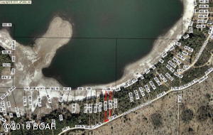 Waterfront lot on Porter Lake. This is one of the largest lakes in Washington County and is very popular for fishing and skiing. Lot has many nice oaks and a nice beach area to relax on. By building close to the top of the lot there would be awesome views of the lake. Lots like this do not often become available, and this one is priced to move! Just down the street is thousands of acres of Water Management land available for public use. This Water Management land is available for fishing, camping, hiking, horseback riding, and other recreational pursuits. This is a bankruptcy sale and will be subject to the Bankruptcy Court provisions. A copy of the addendum is uploaded to the documents tab.