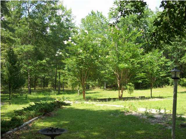 A wonderful building lot that allows a two story home in an upscale community with beautiful Oaks, two Community pools, docking facilities on a Bayou leading to North Bay and the Gulf. Facilities include a nice Clubhouse for entertaining, women and mens separate Pavillions and a peaceful environment for your family. The homes driveways with garages are in the rear with strolling sidewalks and views of the Community maintained grounds for your enjoyment. There are building restrictions for your protection and the seller will sell direct or build a home for you. Located just a short distance from the hub of Lynn Haven's Ohio Avenue (Hwy 77) and major grocery stores, Doctor's offices and clinics as well. Call for deed restrictions.