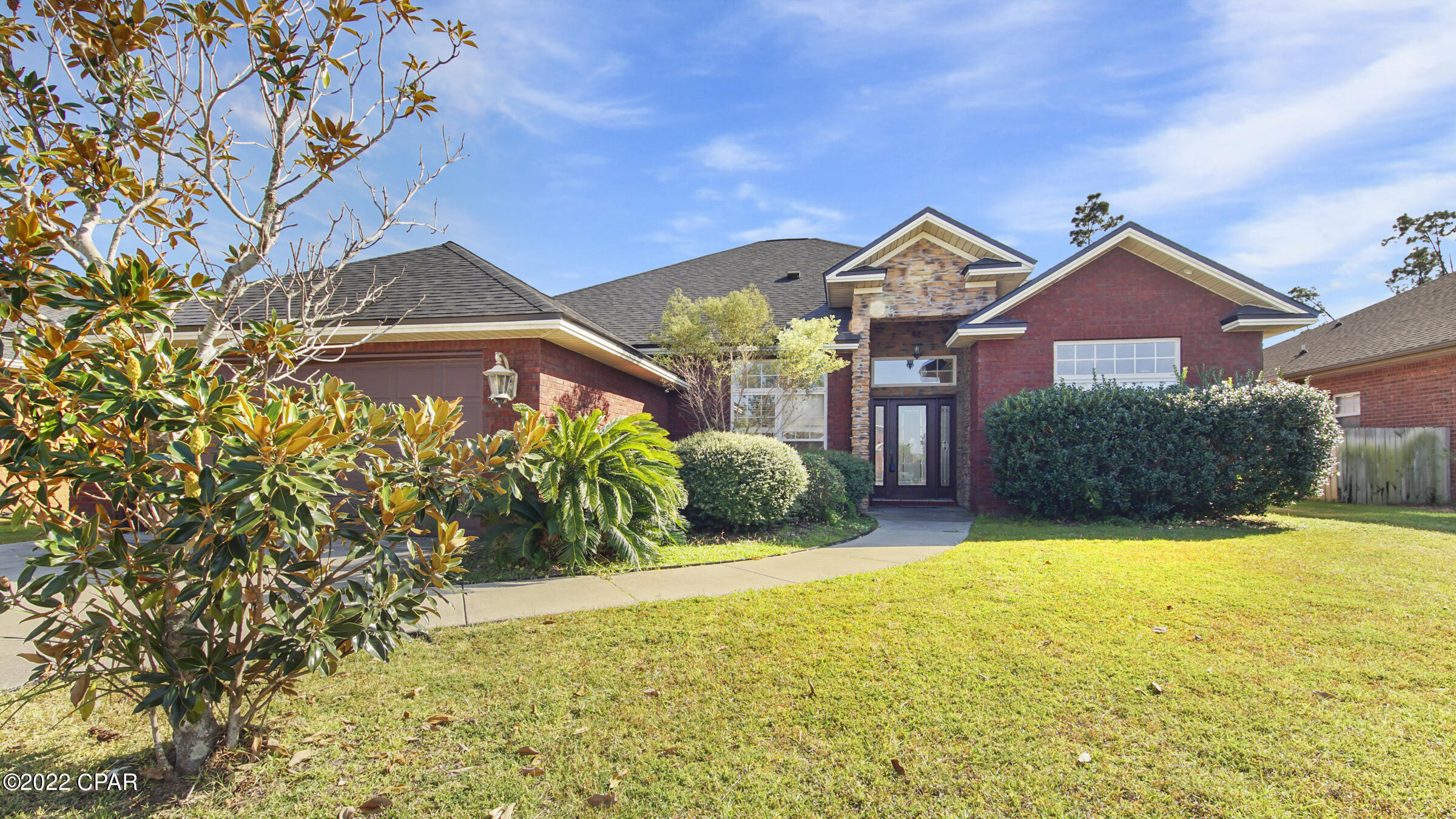 Come see this beautiful and spacious home in Camryns Crossing! Home is tucked away on a quiet cul-de-sac in a convenient part of Lynn Haven. Enjoy the chef's kitchen, large master bathroom, beautiful fireplace, and fenced back yard. Main areas have tasteful and durable wood-look tile flooring. The front room can be used as an office or utilized as a 4th bedroom. Imagine decorating the beautiful fireplace mantle for all your favorite holidays. Do not miss out on calling this place home!