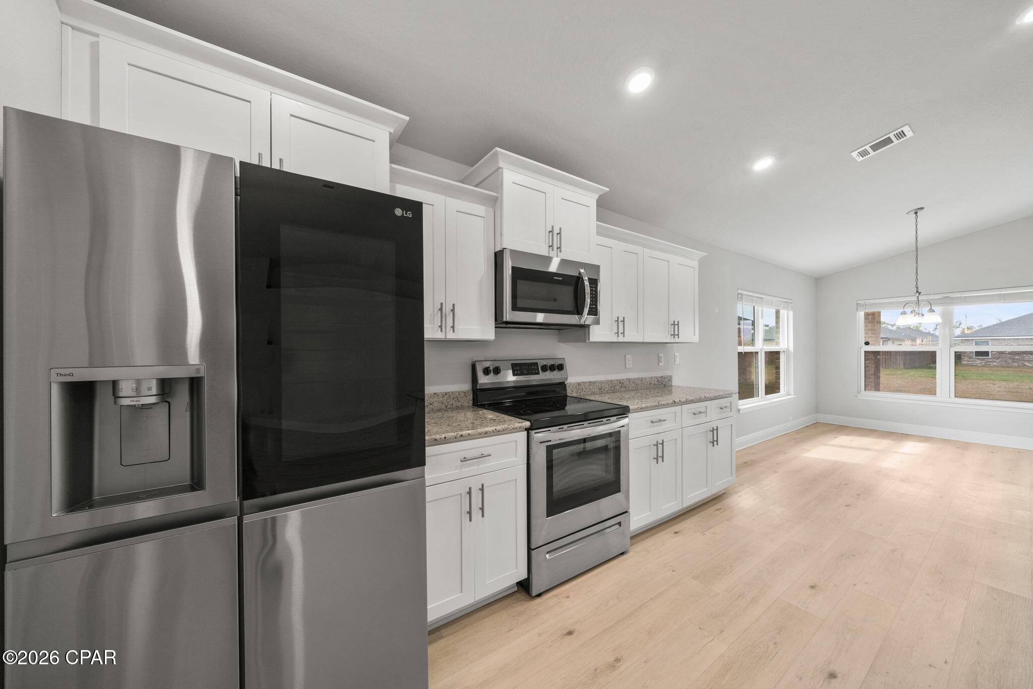BEST Priced in highly sought-after College Station neighborhood of Panama City! This welcoming open floor plan features three-bedrooms, two-bathrooms offering 1,901 square feet of well-designed living space that checks all the boxes for comfortable Florida living.

The split floor plan gives everyone their own space, which is honestly one of the smartest layouts out there. The primary bedroom is a true retreat, featuring a large closet and a double vanity bathroom that makes morning routines a breeze. Vaulted ceilings throughout create an airy, open feel that makes the home live even larger than its generous square footage suggests. Vinyl plank flooring runs through the home, giving you that beautiful look without the fussy maintenance. The kitchen comes equipped with a pantry, because nobody ever complained about having too much storage.

Ceiling fans keep things comfortable alongside the central electric system, and the garage provides covered parking plus extra room for all your stuff. The quality of construction here is evident in every detail, built to handle the Florida lifestyle with ease.

The neighborhood puts you in a fantastic spot with Publix just minutes away for grocery runs, Zollie Young Dog Park nearby for your pets, and North Bay Haven Charter Academy right around the corner. Residents will also appreciate easy access to Mosley High School and even Florida State University Panama City for higher education options.

This one is fresh on the market and ready for its new owners. Schedule your showing today before someone else calls it home! Washer, Dryer, and TV in primary bedroom convey in as-is condition with the sale of this home.