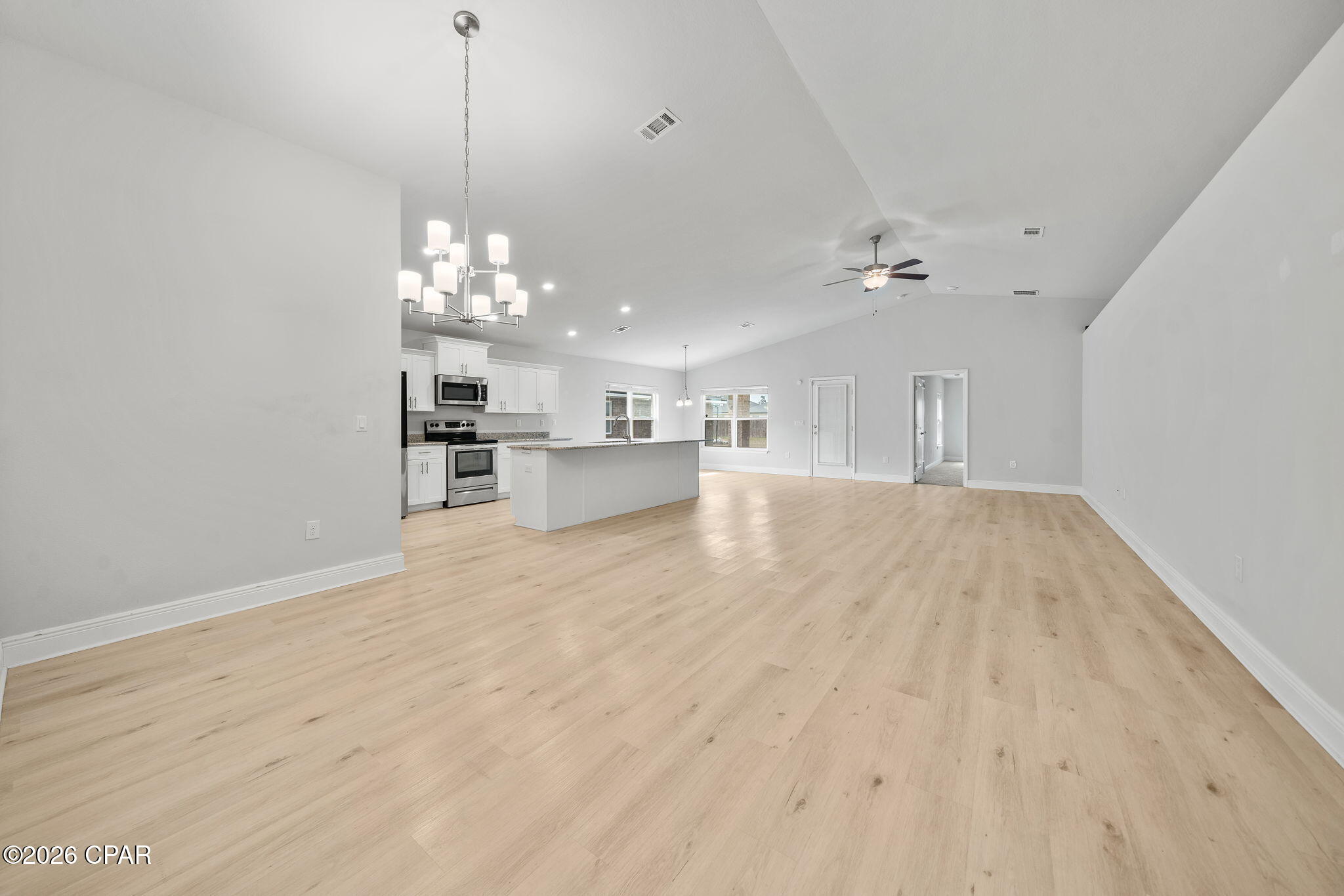 BEST Priced in highly sought-after College Station neighborhood of Panama City! This welcoming open floor plan features three-bedrooms, two-bathrooms offering 1,901 square feet of well-designed living space that checks all the boxes for comfortable Florida living.

The split floor plan gives everyone their own space, which is honestly one of the smartest layouts out there. The primary bedroom is a true retreat, featuring a large closet and a double vanity bathroom that makes morning routines a breeze. Vaulted ceilings throughout create an airy, open feel that makes the home live even larger than its generous square footage suggests. Vinyl plank flooring runs through the home, giving you that beautiful look without the fussy maintenance. The kitchen comes equipped with a pantry, because nobody ever complained about having too much storage.

Ceiling fans keep things comfortable alongside the central electric system, and the garage provides covered parking plus extra room for all your stuff. The quality of construction here is evident in every detail, built to handle the Florida lifestyle with ease.

The neighborhood puts you in a fantastic spot with Publix just minutes away for grocery runs, Zollie Young Dog Park nearby for your pets, and North Bay Haven Charter Academy right around the corner. Residents will also appreciate easy access to Mosley High School and even Florida State University Panama City for higher education options.

This one is fresh on the market and ready for its new owners. Schedule your showing today before someone else calls it home! Washer, Dryer, and TV in primary bedroom convey in as-is condition with the sale of this home.
