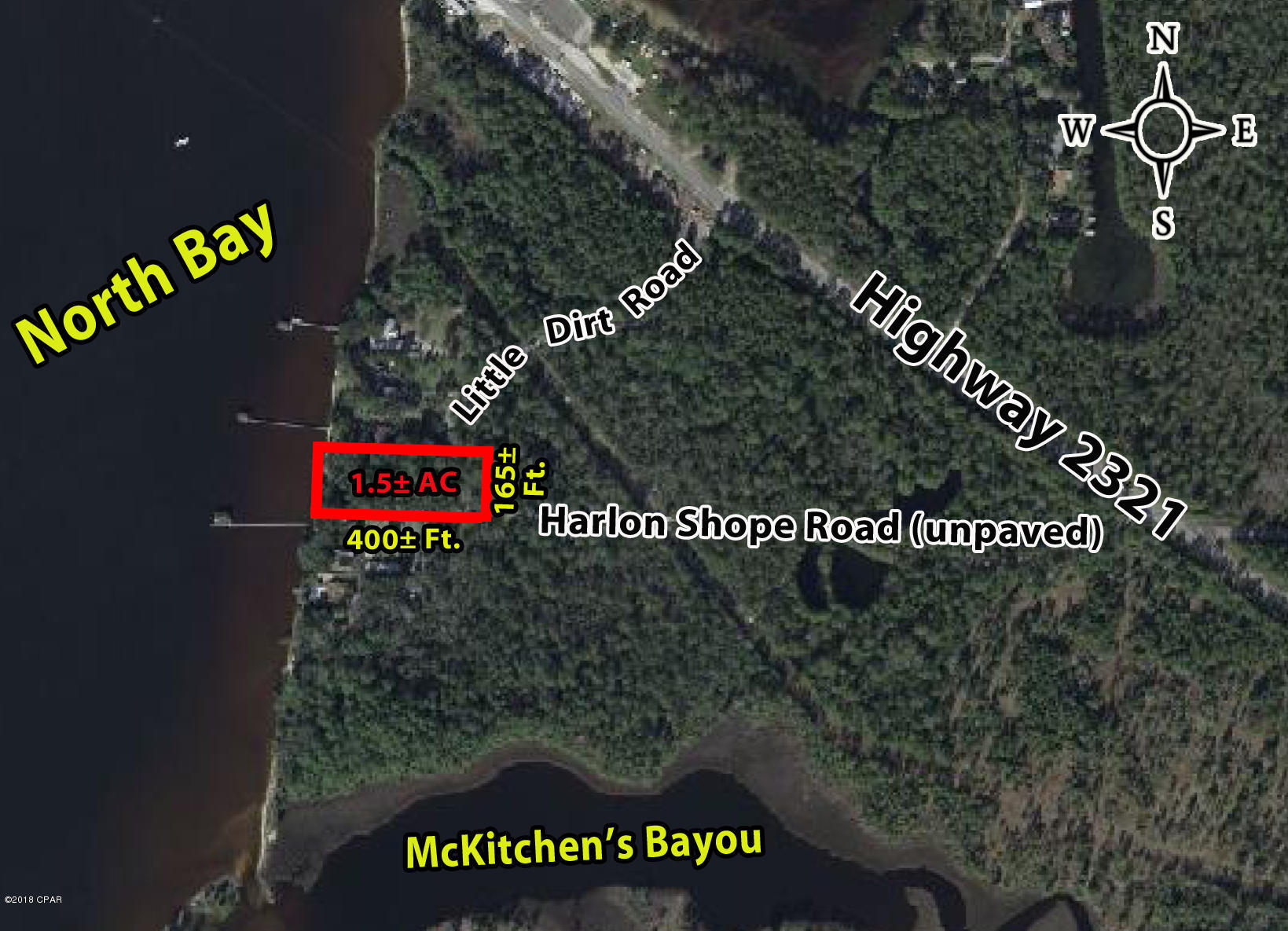 HUGE PRICE REDUCTION! Beautiful secluded wooded waterfront home site on North Bay with water view to the west for those spectacular Florida sunsets.  This site is noted as Site 1 on the property aerial. This home site is located near the Deer Point Elementary School and the new approved 97.8± acre Lynn Haven Bayou Park & Preserve, with wildlife viewing, trails, playgrounds and outdoor classrooms, with an anticipated completion date in the near future. Additional vacant waterfront and interior land parcels available from .84 acres to 130 acres along the Highway 2321 corridor in the Deer Point Lake and North Bay area.