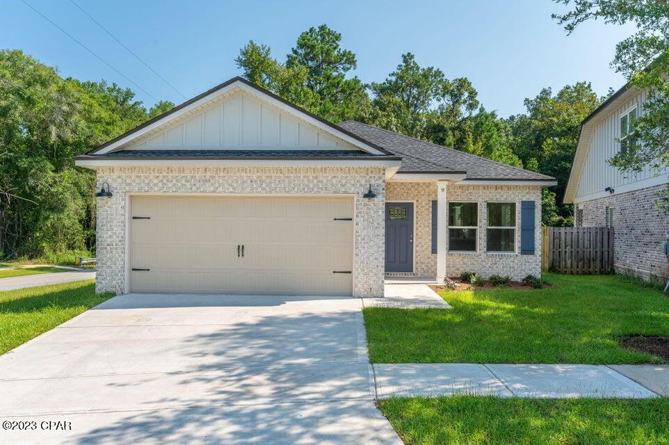 SMALL BUT MIGHTY + AFFORDABLE all brick home features raised ceiling, open concept floor plan through the great room/kitchen/dining, granite or quartz countertops throughout, Luxury Vinyl Plank in common areas, carpet in bedrooms. The kitchen has a bar with seating + dining area, pantry, white shaker style cabinets, stainless steel appliances, recessed lighting, owners bath has tiled shower, double vanities and walk-in closet. Cozy rear porch for relaxing, privacy fenced lot with sprinkler system. Completion date is mid-late August, call Jenny or Patti for more details! Elevation may vary slightly.