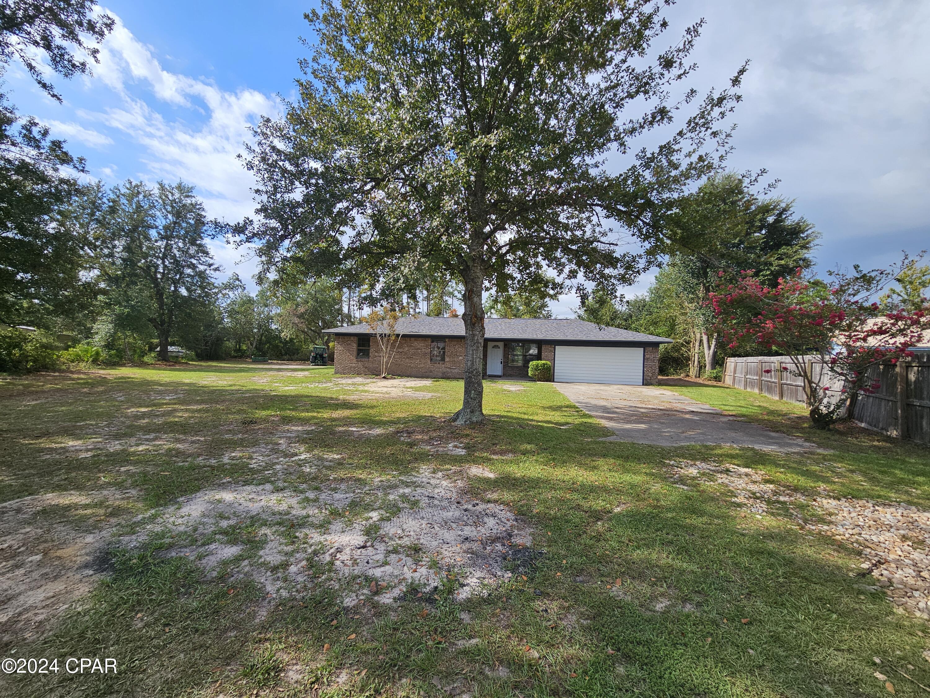 Get this month for free, on this 4-bedroom 3 full bath home located on 1.4 acres. Needing lots of room for your family and toys? Then here it is close to everything. This split plan home offers two master bedrooms with lots of room, open living room and dining area and a completely brand-new kitchen.  The additional bedrooms are good size, and this home has 3 full bathrooms and laundry room. Outside offers covered front porch, open back patio and a large yard building. This home also has a lot of upgrades added to make your home life much more enjoyable. Call for your tour today.