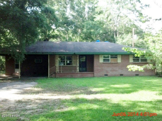 Brick home close to Baptist College in Graceville, Florida. This home needs work to include a roof, new ceilings and flooring but has a lot of potential. Three bedroom, 2 bath home with nice kitchen. Refrigerator, stove, oven and dishwasher. Home has large deck on back of property and back yard has chain-link fencing. Fireplace in den. Priced to sell ! ! Seller makes no representations or warranties as to the condition of the property, improvements or appurtenances, and property is being sold As Is - Where Is. This home will not qualify for any kind of financing and will require cash only buyers. Please provide proof of funds with any offers.