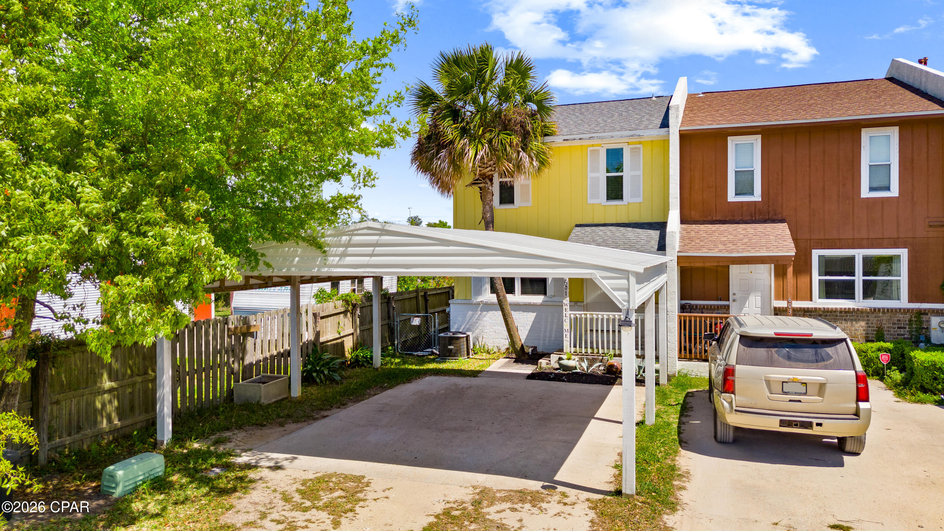 Seller offering $5,000 towards Buyer's Closing Costs & Rate Buydowns! Stunning views from this Waterfront End-Unit Townhome at Waters Edge on Callaway Bayou! With Deepwater Access, the dock was previously replaced for all of your recreational activities! As you step inside, you are greeted with a large Kitchen opening to the Dining & Living Room. For added convenience, there is a Laundry Room & Half Bath downstairs. Don't forget to check out the bonus room for your furry friends under the stairs! With amazing views from the living room & bonus room in the Primary Suite, this property provides the perfect opportunity to enjoy the beauty of one of Florida's best assets. A covered back porch opens up to plenty of room to entertain a large crowd. Upstairs, the Primary Suite features 2 closets & a full bathroom in addition to the bonus sitting room. Also upstairs are the 2 additional bedrooms & another full bath. In 2019, updates included sheetrock, lighting, doors, windows, cabinets, & appliances. Between 2020 & 2024, upgraded downstairs flooring & an oversized 20' x 24' carport were completed. Since then, new paint throughout, kitchen countertops, & side walkway upgrades have been done. Come see this beautiful property for yourself today!