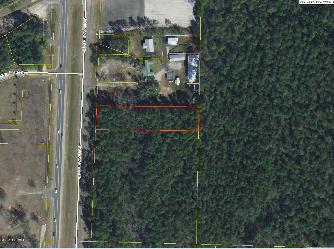 This exclusive piece of land, is just off of Hwy 331, in Freeport, Florida. As construction of this highway is near complete, this piece of land will be a pinnacle point of accessibility to anyone entering or leaving South Walton. Minutes from the world's most beautiful beaches, fine dining, and shopping, this is the perfect piece of land to build on. All measurements are approximate. Please measure if needed.