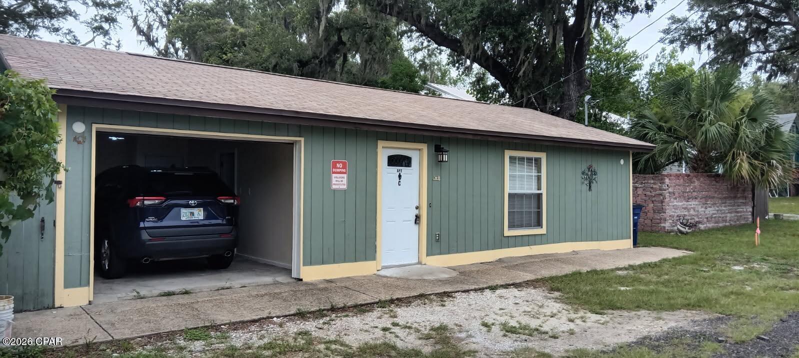 Charming 1-bedroom, 1-bath home in Panama City, FL, freshly painted and updated with dark wood LVP flooring throughout. The kitchen features new appliances, and the property includes a one-car garage for convenient parking. Outside, a fenced back deck area offers private outdoor space, and lawn care is provided for easy upkeep. This residence combines recent updates with practical features for comfortable living.
