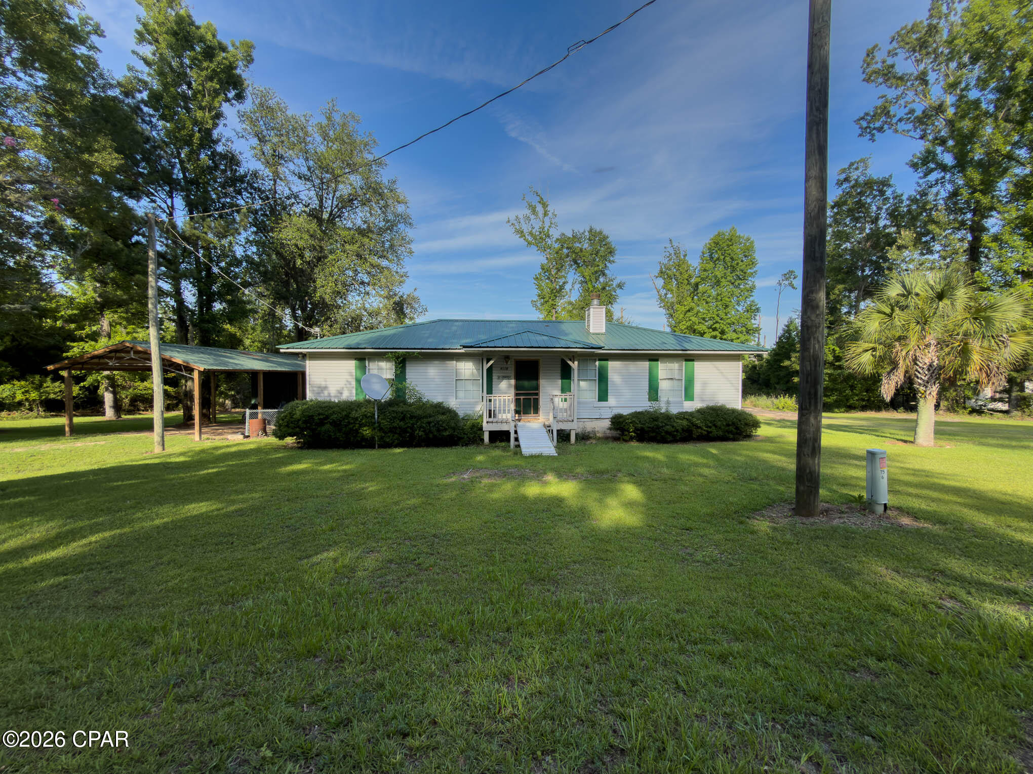 Nestled along a peaceful slough that flows directly into the Chattahoochee River, this charming three bedroom, two bath home offers a rare blend of comfort and waterfront living. Step outside onto an expansive back deck--partially screened for year-round enjoyment--perfect for morning coffee or evening gatherings. A versatile pole barn with an attached garage provides ample storage for toys, tools, or a workshop. Best of all, you can launch a canoe or kayak right from your own backyard and paddle into the river, with the nearest boat ramp less than a mile away. Whether you're an avid angler or simply seeking a serene retreat, this property is your gateway to riverside adventure. Make an appointment to see it today!