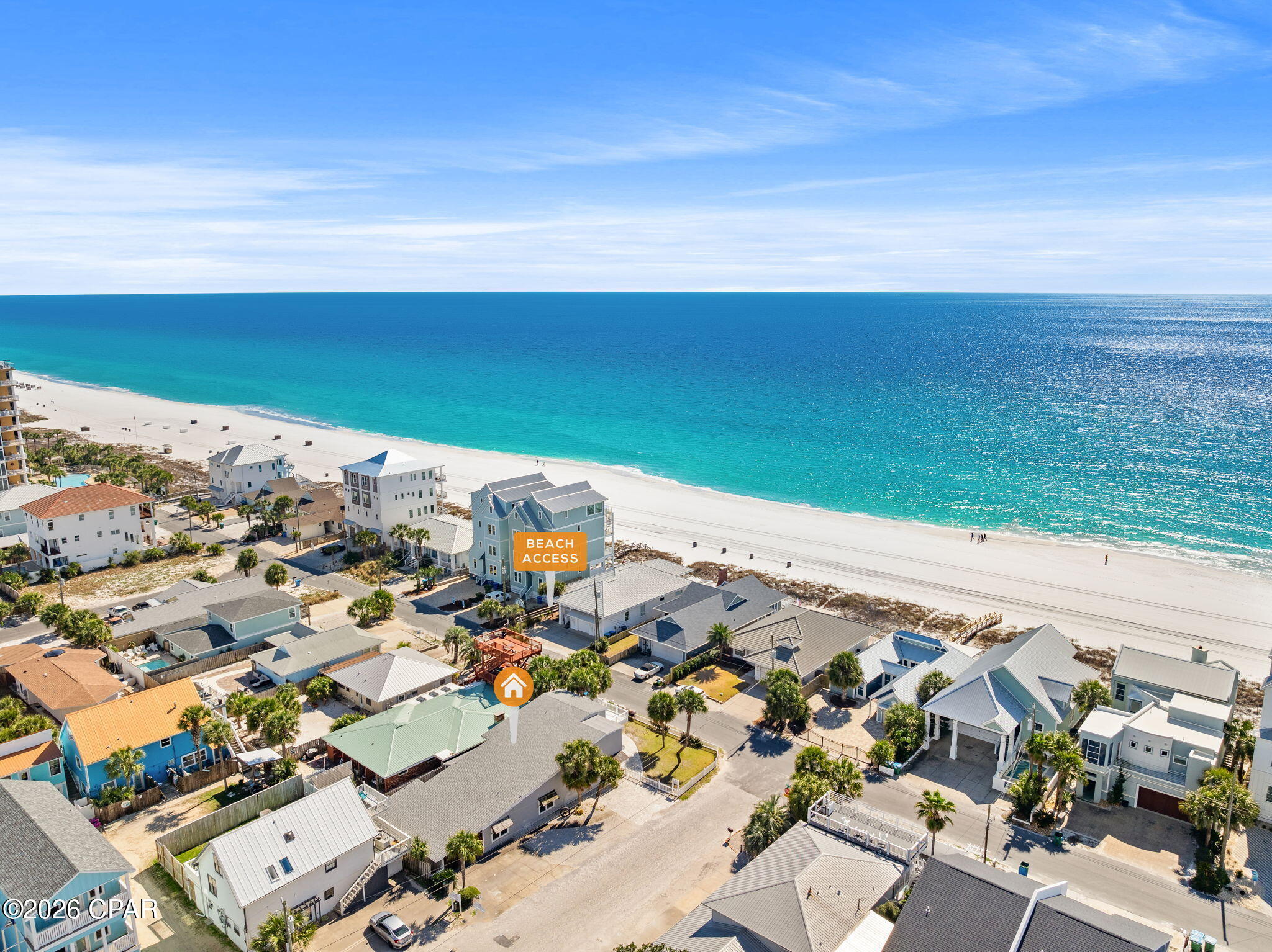 Prime Gulf-View Coastal Retreat
Perfect vacation rental, second home, or permanent residence, directly across from private Beach Access #13 in an exclusive neighborhood blending year-round residents, luxury retreats, and elite rentals. This 6BR/4BA block home with HardieBoard siding spans 2,700+ sq ft, sleeps 18 comfortably, and delivers turnkey rental income.  

Open-Concept Luxury Living
Stunning professional décor highlights an expansive great room with 18ft beamed ceilings, wood-burning fireplace, and seamless flow from living to dining to well-appointed kitchen.  Granite countertops, steel-blue cabinetry, and stainless-steel appliances elevate meal prep, while French doors from the Florida room open to a resort-style outdoor oasis.

Outdoor Entertaining Paradise
Cedar pergola shades a large dining table, bubbling Hot Tub, and breezy seating - ideal for Gulf-breeze grilling on the gas BBQ amid family gatherings. Fenced yard, dual outdoor showers, and abundant parking complete the private outdoor haven, just steps from the sand.

Spacious Bedrooms and Suites
On the main level, accommodations include a private 1st-floor primary suite, offering canopy queen bed, sleeper sofa, and full bath.  Additionally, a 1st guest bedroom with king bed, 2nd bedroom with queen bunk bed connected via Jack & Jill bath.  The 3rd and 4th bedrooms, each with queen beds are also linked by their own Jack & Jill bathroom.  This home sleeps up to 18 guest comfortably.  The spiral staircase and modern railings lead to a private suite on the 2nd floor which features a jetted garden tub, large walk-in shower, and private balcony to enjoy the sunrise, sunsets and gulf views.

Additional Features
Fully furnished, rental ready, plenty of parking, 2 outdoor showers, HOT TUB, outdoor seating, fenced yard, tiled floors on entire 1st level, laundry room, block house with Hardieboard siding, connected to the city sewer, roof was replaced in 2019, (two HVAC systems,  two water heaters and kitchen appliances were replaced in 2018), steps away from the beach.