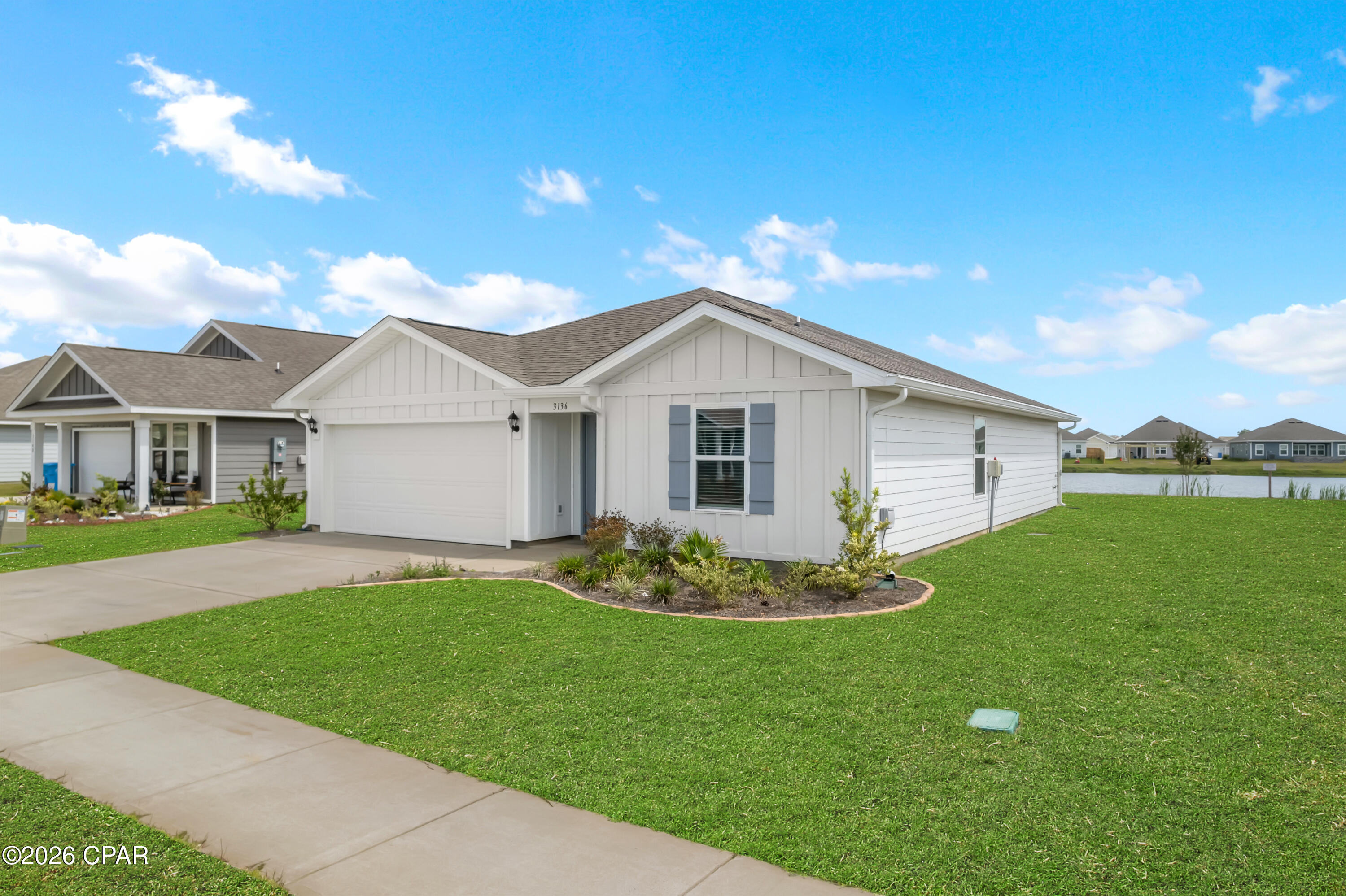 FRESH. CLEAN. MOVE-IN READY. 3136 Rachel Place in Hodges Bayou Plantation offers a well-maintained 4-bedroom, 2-bath Freeport floor plan with the feel of newer construction without the wait. Built by D.R. Horton, this resale home has been exceptionally cared for and shows beautifully.
Inside, the split-bedroom layout provides functional separation between the primary suite and secondary bedrooms, while LVP flooring extends through the main living areas with carpet in the bedrooms. The open-concept kitchen, dining, and living areas overlook a peaceful water backdrop, giving the main gathering spaces a calm, open feel.
The kitchen features Calacatta quartz countertops, stainless steel appliances, generous workspace, and a layout designed for everyday convenience. Matching Calacatta quartz continues into the bathrooms, and the washer and dryer are included with the sale.
The spacious primary suite is tucked away from the secondary bedrooms and also enjoys the relaxing water view. Additional features include gutters, white faux wood blinds on all windows, a 2-car garage, and existing privacy fencing along the neighboring lot lines.
Located just 1.4 miles from the Deer Point Lake boat access, this Hodges Bayou Plantation home provides convenient access to boating, fishing, and water recreation, with Deer Point offering routes toward the bay and Gulf. The property is also approximately 30 minutes from Tyndall Air Force Base.
Exceptionally maintained and move-in ready, 3136 Rachel Place offers a clean, newer-construction feel in Hodges Bayou Plantation. All information is believed accurate but not guaranteed; buyer to verify if important.