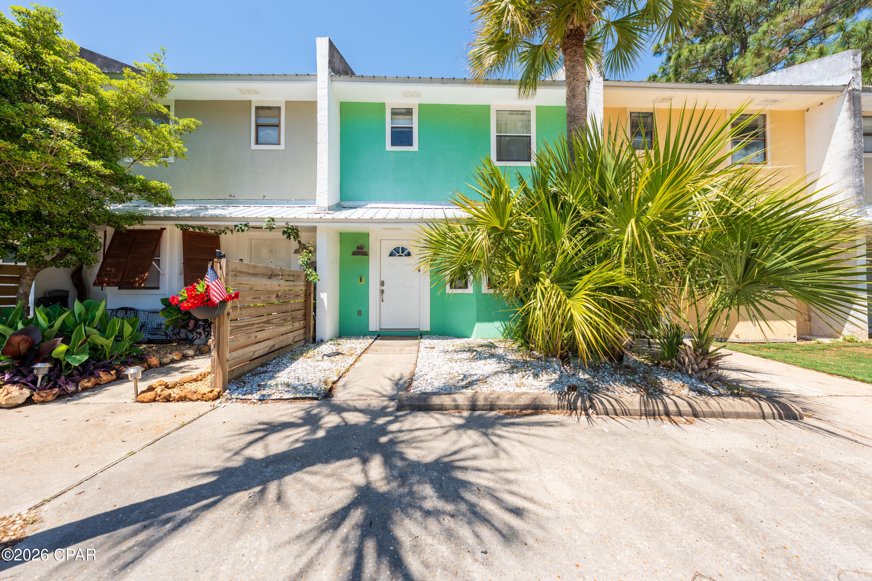 OPEN HOUSE SATURDAY JUNE 6TH FROM 10 AM -1PM. Welcome to 3816 Quarts Street in Panama City Beach, FL--a prime opportunity to own a beach home near the Gulf of America with strong short-term rental potential and no HOA.

This 2-bedroom, 2-bath townhome in Panama City Beach features a traditional floor plan with defined living spaces, offering separate living, dining, and kitchen areas for added privacy and functionality. The living area provides a comfortable and efficient space that's easy to maintain--ideal for a vacation home, second home, or income-producing rental property.

A standout feature is that this property is connected to city sewer, a rare and highly desirable advantage in this area where many homes rely on septic systems--offering added convenience, lower maintenance, and long-term value.

Step outside to enjoy an impressive private backyard measuring approximately 56' deep by 19' wide, providing ample space for outdoor living, entertaining, or future enhancements. Extending from the rear of the home is a 17' x 16' wooden deck, perfect for grilling, relaxing, or hosting guests after a day at the beach.

The kitchen offers ample cabinetry and workspace, while upstairs bedrooms provide natural light and a practical layout suited for guests or renters.

Located just minutes from public beach access in Panama City Beach, you're a short walk or golf cart ride to the white sand beaches and emerald waters of the Gulf Coast. Boating enthusiasts will love the proximity to the Dolphin Street boat ramp, a public boat launch located less than one mile away--making it easy to get out on the water for fishing, cruising, or waterfront dining.

With short-term rentals allowed in Panama City Beach and no HOA restrictions, this property is ideal for investors seeking a Panama City Beach vacation rental, second home buyers, or anyone looking for an affordable Florida beach property near the Gulf.

Don't miss your opportunity to own in one of the Gulf Coast's most sought-after beach communities.