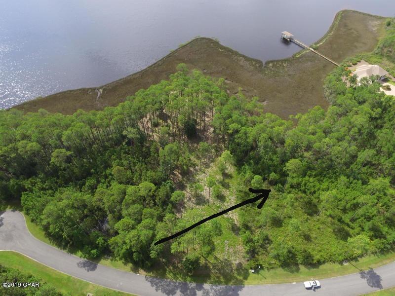 Spectacular Waterfront in the Desirable Laird Bayou! True year round deep water access. No worries of low tides or low bridges preventing you from the Gulf of Mexico and Intercoastal Waterways. Beautiful views across Laird and Cooks Bayou. Seconds from East Bay. Cooks Bayou Marina is less than a few miles away which offers fuel and live bait. At nearly 3/4 of an acre there is plenty to room to build your Dream Home. Laird Bayou is a gated community that boasts beautiful custom built homes. Amenities include a pool, boat launch, and RV/ Boat Storage. This is the best priced dockable homesite currently available in Laird Bayou. Schedule a private tour today.