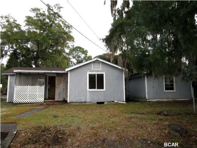 LOADS OF POSSIBILITIES WITH THIS CENTRALLY-LOCATED HOME IN ST. ANDREWS! Situated on a corner lot, this homes features a lot of living area with a spacious kitchen and dining room, three good-size bedrooms, and a large Family room with built-in cabinets that could also be used as a fourth bedroom. The home needs a lot of TLC, but it has great potential! Home being sold in its AS IS condition.
