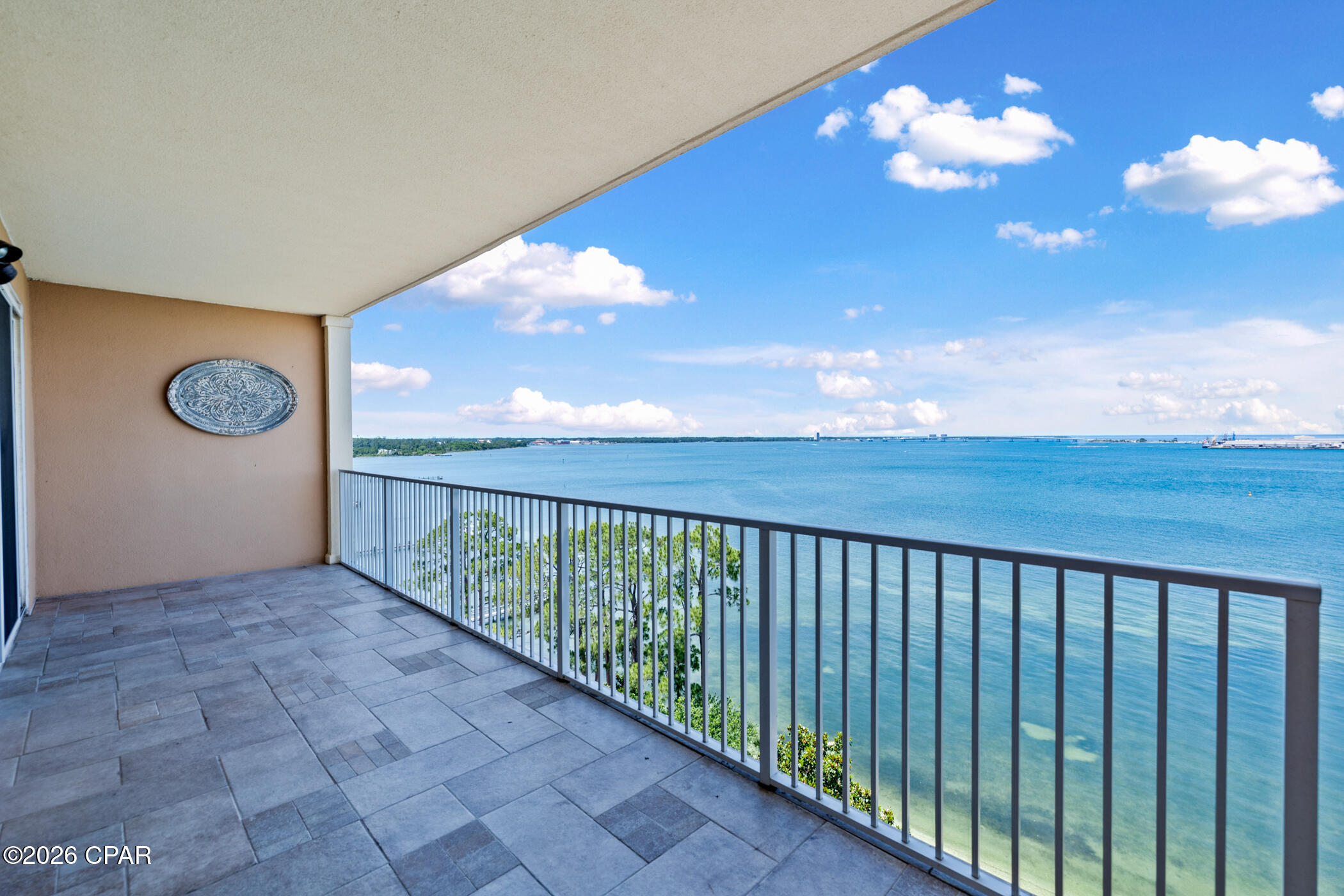 Welcome to luxury coastal living at Magnolia Bay Club! This completely updated, gated condo offers an unparalleled lifestyle with stunning, unobstructed views of the bay. Every inch of this residence has been refined, featuring gorgeous hardwood floors throughout and new, elegant granite countertops in both the kitchen and all bathrooms. The open floor plan is designed to maximize the scenery, providing a sophisticated backdrop for both daily living and entertaining.
Step outside to enjoy a premier suite of resort-style amenities, including a bayfront pool, fitness center, a community gathering room, and the convenience of covered parking. Water enthusiasts will love the on-site dock providing direct bay access to the Gulf of Mexico, as well as dedicated areas for fishing and kayaking.
Perfectly situated just minutes from the world-famous white sand beaches, full-service marinas, championship golf courses, and the area's best shopping and dining, this turnkey property offers the best of Panama City Beach in a serene, secure environment.