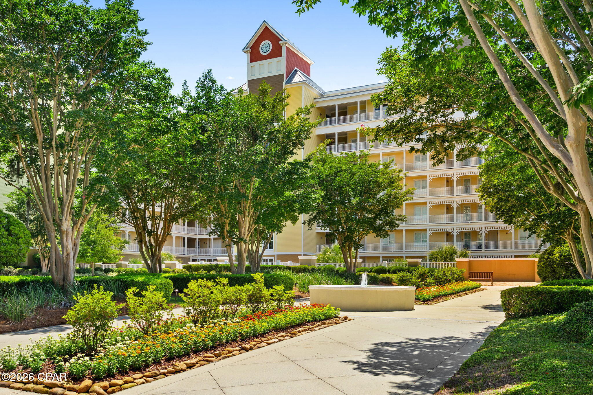 Experience waterfront living at its finest in Harbour Village, nestled in the heart of historic St Andrews.  This highly desirable community is just steps to Oaks by the Bay Park and St Andrews Marina with easy access to the Gulf.  Local restaurants and shops encourage you to walk the charming historic  village of St Andrews.  Watch boats cruise to and from the small St Andrews Marina or City Port.  Enjoy a short boat trip to pristine Shell Island.

Residence #713 is a desirable corner unit offering spectacular panoramic views and unforgettable sunrise and sunsets.  The open living spaces showcase rich wood grain porcelain tile floors throughout, granite kitchen countertops, custom lighting and designer ceiling fans, abundant custom storage,and a cozy gas fireplace.  Remote-controlled sunshades on the west-facing balcony provides comfort while you relax and enjoy the ever changing waterfront scenery.

Residents enjoy approximately 2 acres of  beautifully landscaped  rooftop garden above the parking garage, featuring gas grills, walking paths, and a gazebo with an outdoor fireplace - an inviting setting for entertaining friends or gathering with neighbors, or simply enjoying the peaceful surroundings.

Included is Boat Slip #5, just a short stroll down the private pier.  The slip is equipped with a boat lift, 120 volt electrical service, and fresh water at the slip - making it easy to enjoy life on the water.

Harbour Village also offers more than 600 feet of private sandy Beach, perfect for shelling, wade fishing, relaxing in a beach chair, birdwatching or ending the day with a spectacular St Andrews sunset.

Your vehicle is protected in the clean, secure community parking garage.

This is more than a condominium - it's a waterfront lifestyle that few have the opportunity to experience.  A home you MUST SEE to appreciate.

Purchase includes Boat Slip #5 w/Marina Storage #7
and Garage Storage #04