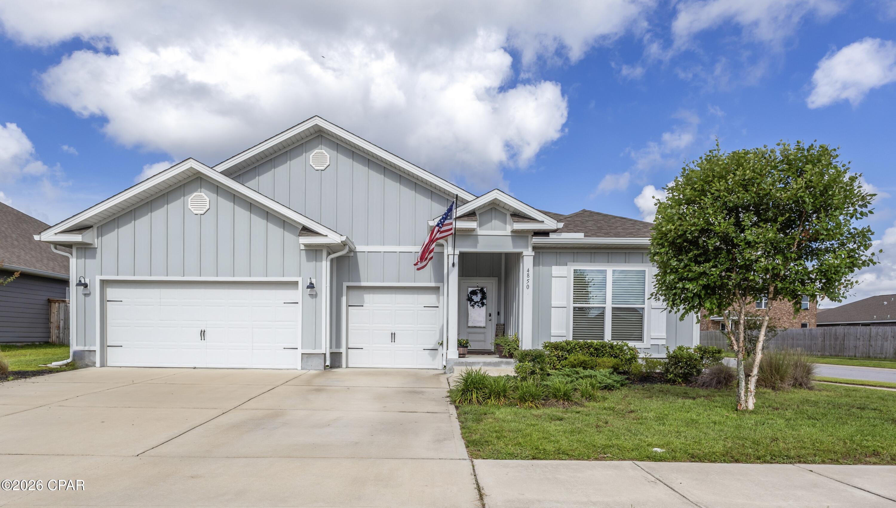 WOW! **GENEROUS SELLER INCENTIVES!** Up to 3.3% (of purchase price) seller credit toward buyer closing costs, rate buy down etc., a 2-year home warranty, and 1 year of HOA dues paid with an acceptable offer! This is an exceptional opportunity for buyers!
Welcome to this beautiful 4-bedroom 4-bath home in the highly sought-after Titus Park community, offering a community pool and dog run within walking distance. With 2,817 sqft of thoughtfully designed living space and situated on a corner lot, this spacious residence combines timeless curb appeal with an attractive Hardie board siding construction.
Step inside to an inviting foyer that immediately showcases the home's open, modern layout. To the right, two bedrooms share a well-appointed Jack-and-Jill bathroom. As you continue through the home, you'll find a conveniently located half bath, an oversized laundry room, and access to the spacious three-car garage.
Adjacent to the foyer is an expansive second living area that can easily serve as a family room, media room, home office, or fitness space. This area also provides access to a private fourth bedroom featuring its own en-suite bathroom and walk-in closet, making it an ideal guest/mother-in-law suite.
The main living areas feature elegant tray ceilings with crown molding, recessed lighting, and abundant natural light. 
The kitchen is truly the heart of the home and designed with functionality in mind. It offers abundant cabinetry, a large granite-topped center island with additional storage on the back side, a coffee bar, oversized walk-in corner pantry, and stainless appliances-including the refrigerator. Just off the kitchen, the breakfast area overlooks the private backyard, creating the perfect setting for casual dining.
The spacious owner's suite provides a peaceful retreat overlooking the backyard and features a luxurious en-suite bath with soaking tub, walk-in shower, dual granite vanities, private water closet, generous walk-in closet, and additional linen storage.
Step outside to enjoy the fully fenced backyard, complete with an expansive covered patio ideal for entertaining and plenty of room to relax. Additional exterior upgrades include a full irrigation system, wrap around gutters, and a Culligan whole-home water softener system, adding both convenience and value. The oversized 30' x 20' three-car garage offers exceptional space for vehicles, storage, hobbies, or a home gym.
Conveniently located just minutes from the growing Lindsey Crossing development with restaurants, shopping, grocery stores, and Starbucks, this home is also approximately 25 minutes to Tyndall Air Force Base and Naval Support Activity Panama City, making it an outstanding location for military personnel and commuters alike.
Outdoor enthusiasts will appreciate being only five minutes from Lynn Haven's beautiful Bayou Park & Preserve, a 99-acre destination featuring walking trails, fitness loops, playgrounds, docks, boardwalks, open pavilions, and abundant green space.
If you've been searching for a move-in ready home, this incredibly popular Camden open floor plan has it all - the spacious living areas, a private guest suite, three-car garage, and an unbeatable location.
All measurements are approximate; buyer to verify if important. Schedule your private showing today!