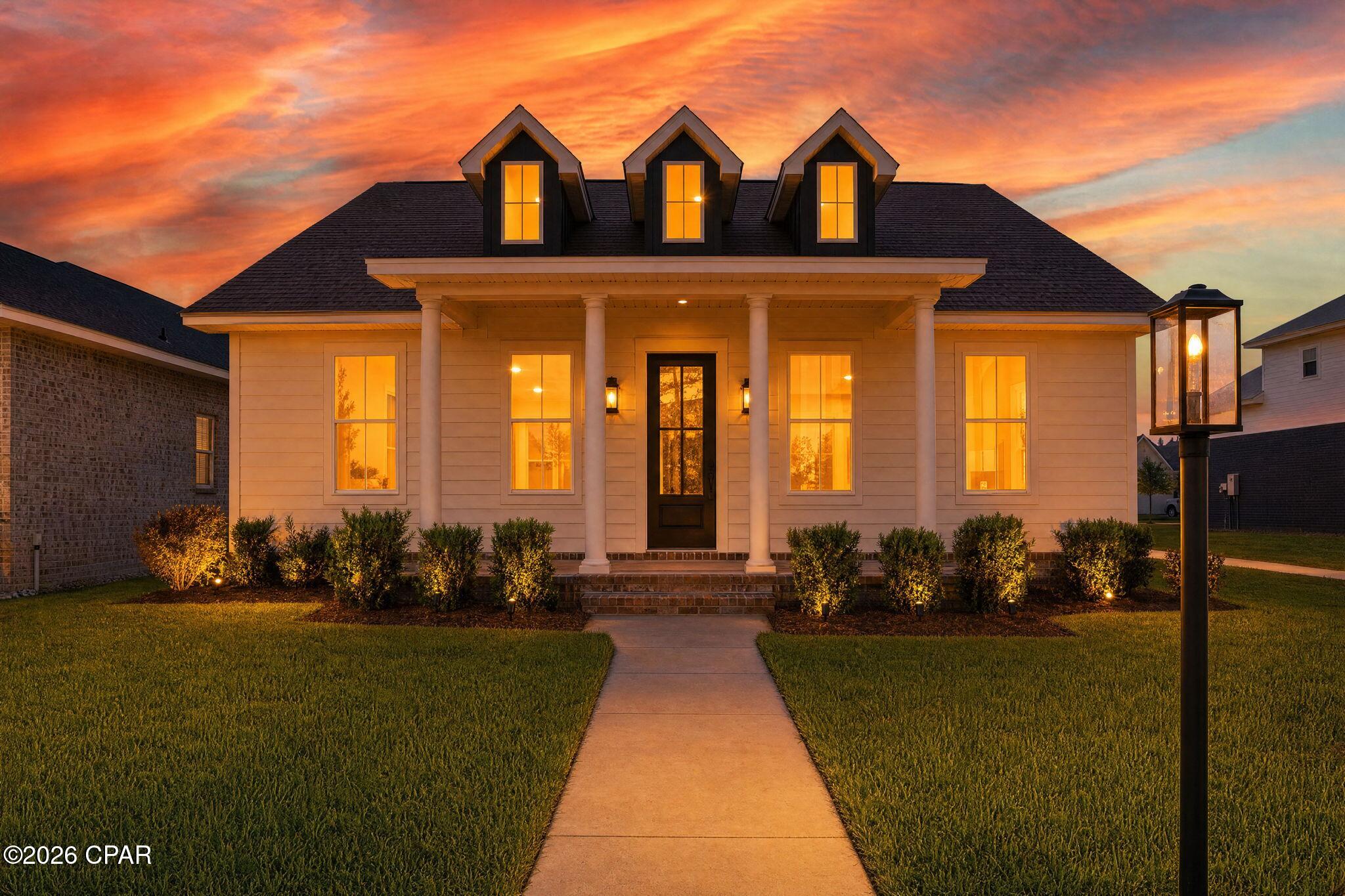 Charming modern craftsmanship meets an unbeatable coastal lifestyle in Panama City Beach's highly desirable Tapestry Park. This meticulously maintained 4-bedroom, 2-bathroom home offers like-new construction without the wait and 2 blocks from the world's most beautiful beaches!
Situated on a picturesque, tree-lined street with sidewalks, the property boasts an inviting front porch that faces a spacious, protected green space with no southern neighbors, offering rare privacy and beautiful open views. Inside, the bright, open-concept floor plan seamlessly connects the kitchen, living and dining areas, making it perfect for entertaining. The impressive first-floor primary suite serves as a private retreat, complete with a massive walk-in closet and modern soaking tub, while the generous laundry room and oversized pantry provide exceptional storage and convenience. There are 2 other bedrooms on the first floor, while the large upstairs bedroom can also be used as flex space.
Step outside to a spacious backyard with ample room for a privacy fence, custom outdoor kitchen, or a private pool/hot tub. Residents enjoy world-class neighborhood amenities, including two community pools, a clubhouse, pickleball, tennis, and basketball courts, playgrounds, and fishing ponds. This golf-cart-friendly community is just minutes from the beach, Pier Park shopping, Frank Brown Park, the PCB Sports Complex, and top-tier dining as well as grocery stores, schools and churches. Plus, Northwest Florida Beaches International Airport is only 20 minutes away, making travel easy for both full-time residents and second homeowners.
Priced to sell and completely move-in ready, this coastal oasis is a rare find in a coveted community!
*Some photos virtual staged for design ideas