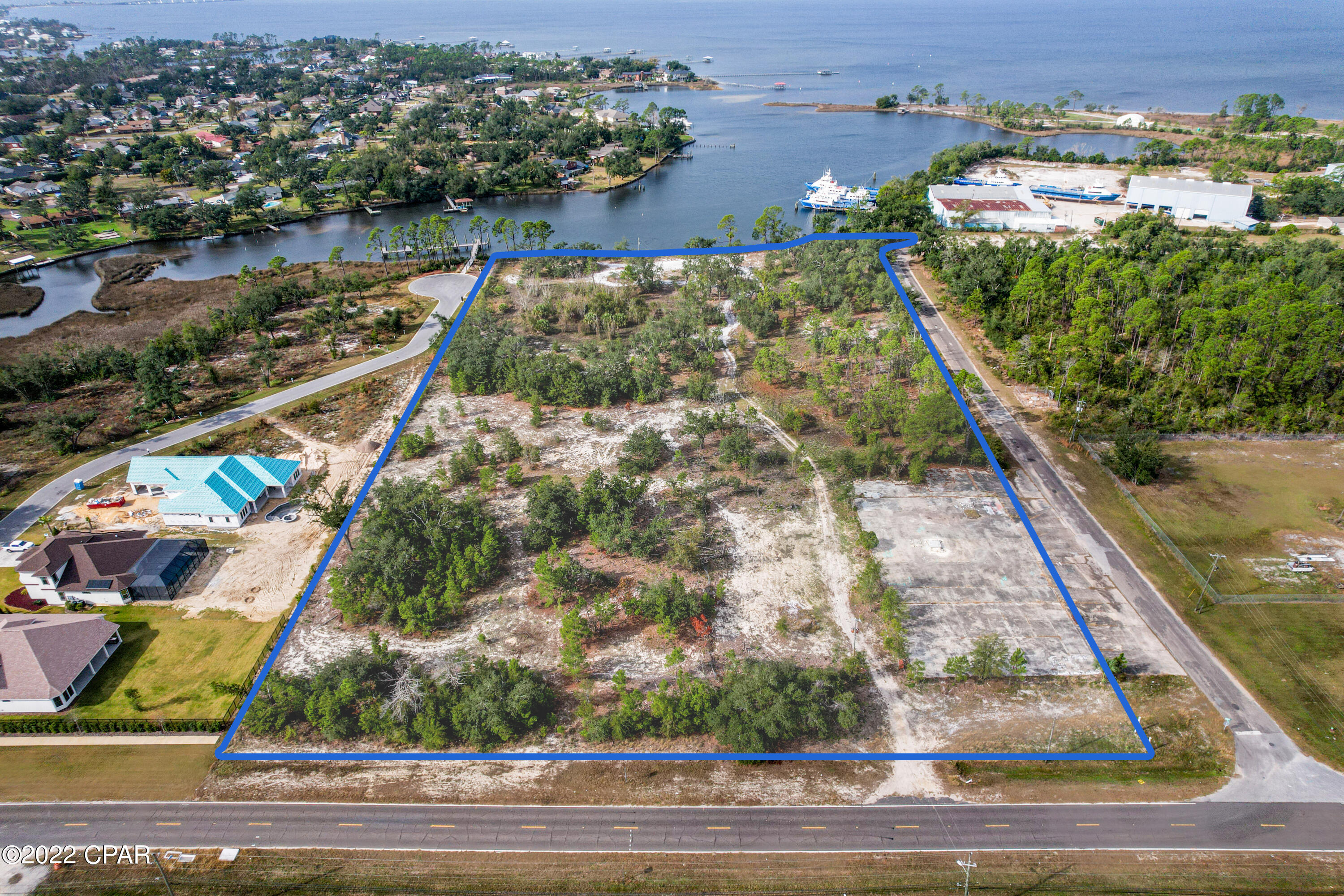 Location Location!!! This Prime piece of commercial real estate boasts of 9.0 +/- acres and the parcel includes  365' +/- of water frontage on the Robinson Bayou.  This commercial development site is in the heart of Panama City, and ready to be developed. The site is zoned Mixed Use-3 (MU-3 | City of Panama City). 

The Lot has been partially cleared. There is a path to drive down to reach the water.