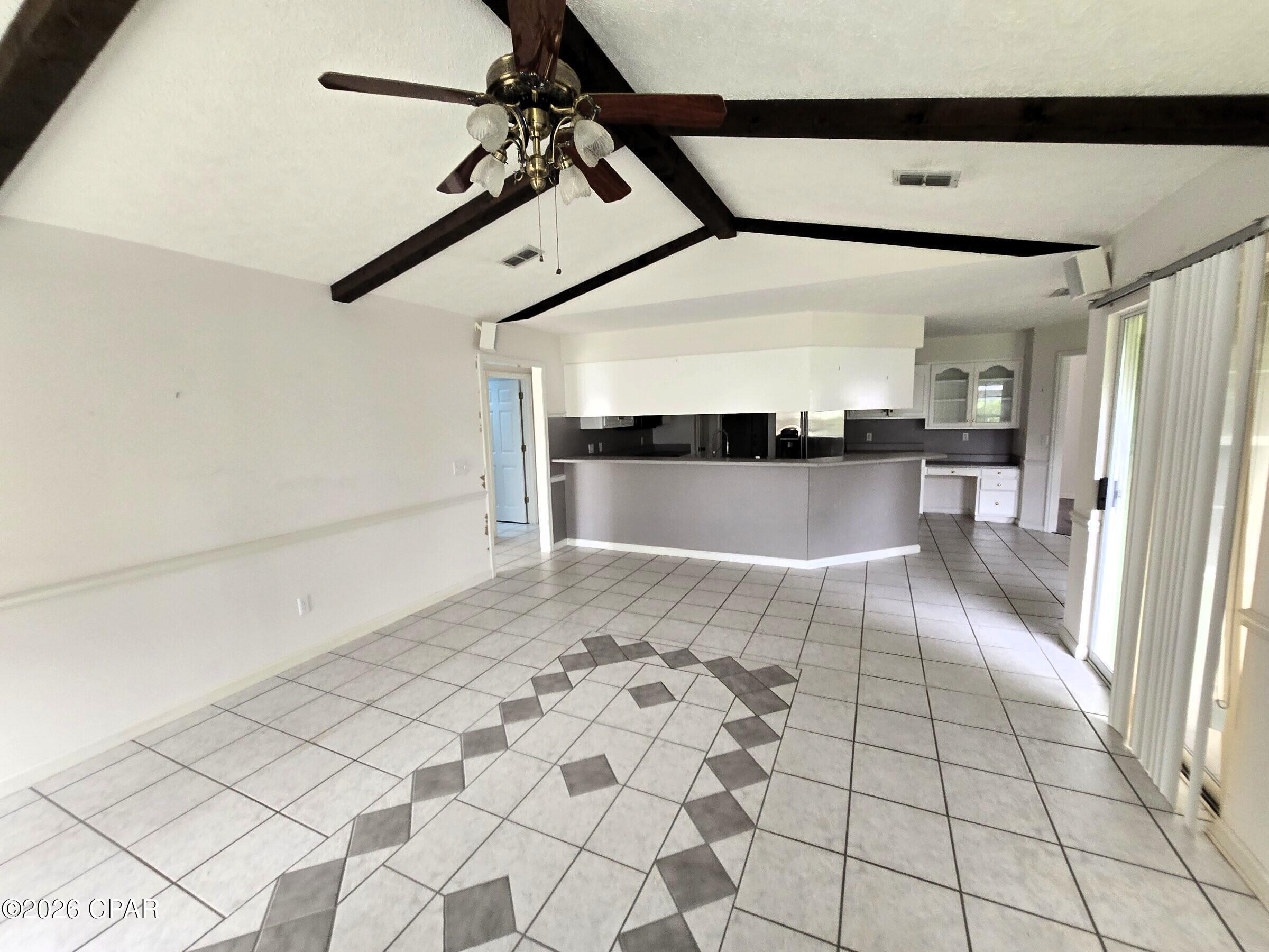 One owner has loved this three-bedroom, two-bathroom home for years, and now it's ready for a new chapter and a little modern flair. With 1,968 square feet of well-planned living space, the layout flows beautifully and gives you a fantastic starting point to make it your own.

The floor plan just works. The split floor plan is a nice touch, tucking the primary bedroom away from the others so everyone gets a little breathing room. and the whole home is craving fresh finishes and your personal touch. Bring your paint samples and your Pinterest board, because the bones here are solid and the possibilities are wide open.

Out back, a 347-square-foot enclosed patio adds bonus space for morning coffee, hobbies, or hosting friends without worrying about the weather. The oversized garage, roughly 22 by 22 feet, swallows up cars, tools, and all the beach gear you can gather. Best of all, there's no homeowners association telling you what to do.

The setting sweetens the deal. Seltzer Park sits just up the road for a quick outdoor escape, and Publix keeps grocery runs simple. St. Andrews State Park and its sugar-white shoreline are minutes away, while Pier Park delivers shopping and dining when you're ready to roam. Florida State University's local campus is an easy drive, and Northwest Florida Beaches International Airport handles your travel plans.

Renovation projects with this much upside don't sit around long near the coast. Bring your vision and schedule your showing today.


 *Information provided is deemed reliable but is not guaranteed and should be independently verified by the buyer*