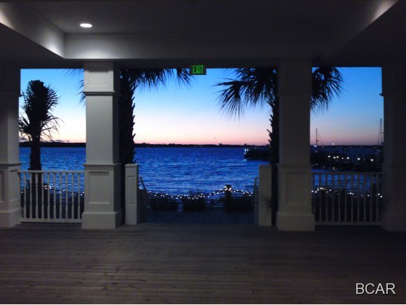 Awesome 2bd/2ba condo in Harbour Village! Granite counter tops, wood & travertine floors. SOUTH view. The oversized balcony is perfect for watching the boats slip through the pass and home to harbor! List price includes 38' Boat Slip #16 and marine storage area #21. Gated community with covered parking, fitness center, gazebo with outdoor fireplace.