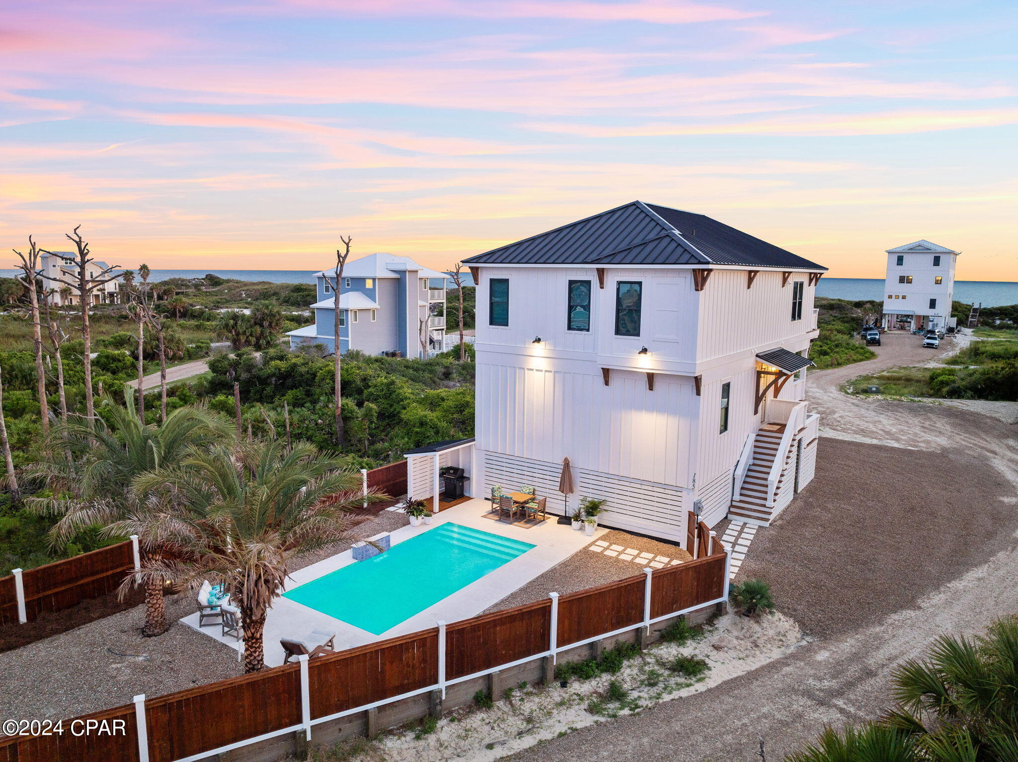 Life isn't always easy... At times, it feels like you can't stop swirling. No matter where you go, you can't find peace. Then, all of a sudden, you find your place. Welcome to 185 Swirly Sun Drive. In the heart of Cape San Blas. A place to lay your head and rest. A place to watch the sunrise. A place to catch your breath. A place to stop the swirling. A place to begin again. This jaw-dropping, brand new construction 4-bedroom beach home is a dream come true. It's the true gem of Cape San Blas. Cutting-edge design with full modern amenities, coupled with resort-like elements, make this home the epitome of luxury and retreat. White Cafe appliances, Quartz countertops, Wet bar & wine fridge, Spa Bathrooms, Beautiful Decor... no detail was missed! This home comes FULLY-FURNISHED and is truly turnkey ready for use as a primary residence, secondary home, or incredible investment, with rental projections of almost $200k! What sets it apart even more is that there is NO HOA, offering owners freedom from additional fees and restrictions, making it an even more attractive opportunity for personalized living or lucrative rental management. Merely steps from the Beach with Incredible Gulf Views from each floor, this is a true beach home featuring your own private beach entrance where dogs are welcome to run alongside you. If you need a break from the beach, you can retreat in your very own backyard oasis. Heated, saltwater pool, stunning landscaping, outdoor shower, outdoor grill and privacy fence creates the perfect spot to luxuriate. If you are looking for 30A without the traffic or hustle this is your place to stop the swirling and find your peace...