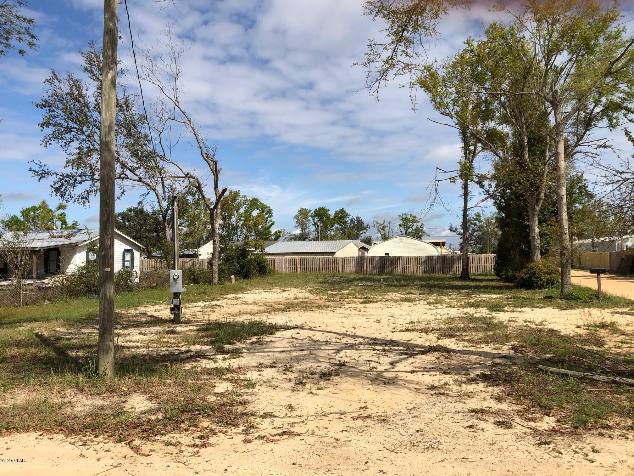 This is a cleared lot and has had a manufactured home on it in the past.  There is a power pole, well, and septic tank system on site.  Corner lot just off Hwy 231 and near Hwy 390.  Close to town and a very convenient location.  Selling as is.  Buyer should verify all information, dimensions, etc.