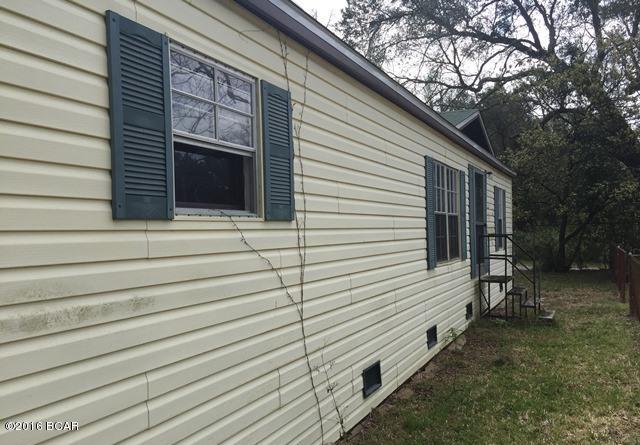 Property consists of a large double wide manufactured home connected to a guest house. This home is surrounded by fence on a corner lot. This spacious home has an enormous living room, generous kitchen, plenty of shade and a large covered back porch. There is a sizable shed for extra storage and plenty of yard space for pets.