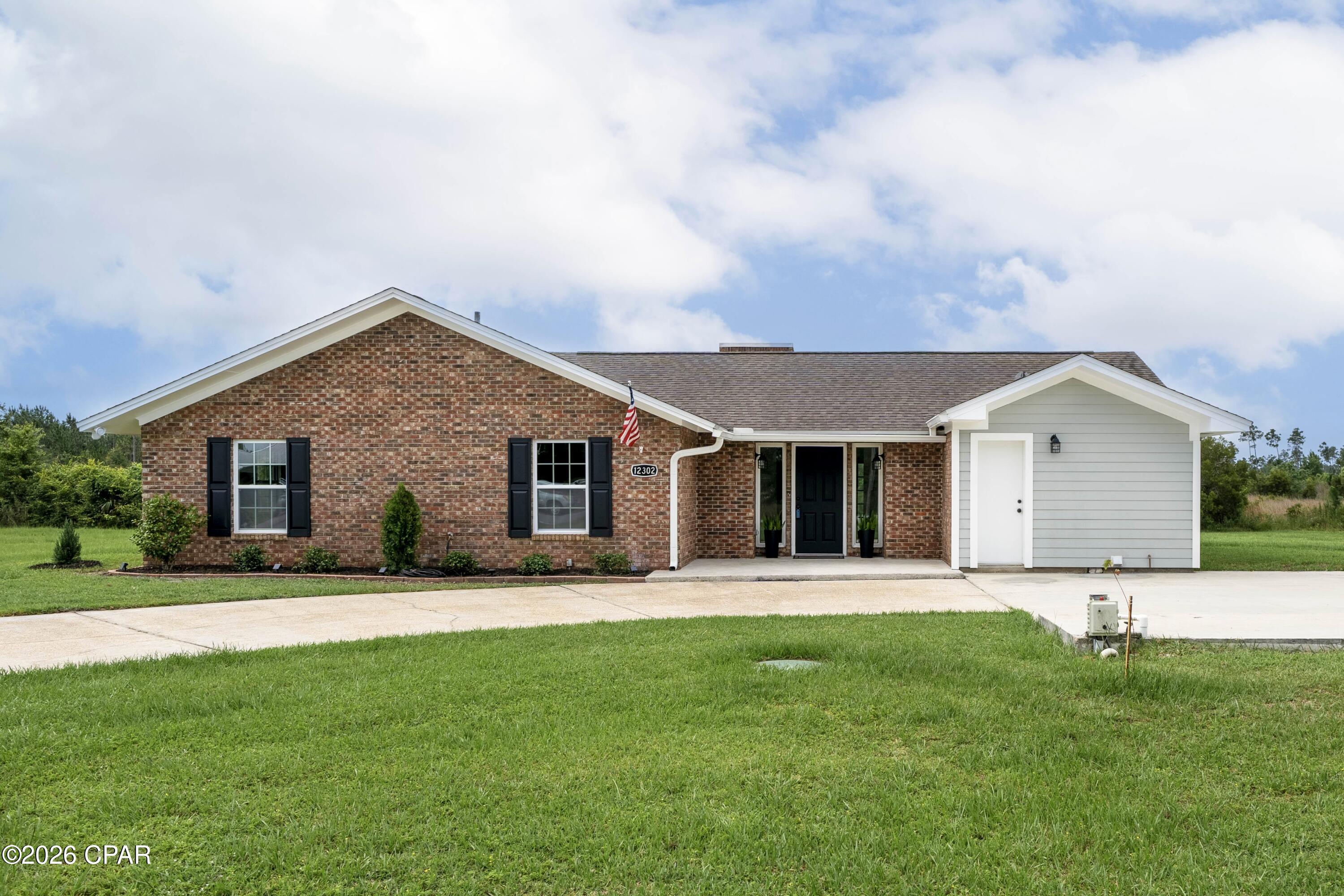 Welcome to 12302 Country Club Drive in the desirable Sandy Creek community! If you're looking for a move-in ready home where the work has already been done, this is it.
This beautifully updated 3-bedroom, 2-bath home offers the perfect blend of comfort, convenience, and the peaceful lifestyle that makes Sandy Creek so special. Inside, you'll find tile flooring throughout the main living areas, brand-new LVP flooring in all bedrooms, fresh interior paint, new light fixtures, and brand-new windows that fill the home with natural light. Major system updates provide peace of mind, including a 2024 HVAC system and two water heaters, ensuring plenty of hot water for family and guests alike.
One of the standout features of this home is the wonderful Florida room, offering a bright and relaxing additional living space perfect for morning coffee, entertaining, or simply enjoying the surrounding peaceful setting.
Outside, enjoy fresh landscaping and a property that is truly turnkey--simply unpack and start enjoying your new home.
Sandy Creek is known for its quiet, laid-back atmosphere where life moves at a more comfortable pace. Residents enjoy access to excellent fishing, boating, and outdoor recreation, with nearby waterways providing endless opportunities to enjoy the Florida lifestyle. Whether you're spending the day on the water, relaxing at home, or exploring the surrounding area, you'll appreciate the serenity this community offers.
Conveniently located just minutes from Tyndall Air Force Base, the white-sand beaches of Mexico Beach, and the shopping, dining, and entertainment of Port St. Joe--and close to Panama City Beach as well--this home provides the perfect balance of peaceful living and easy access to everything the Forgotten Coast has to offer.
Move-in ready, beautifully updated, and located in one of the area's most desirable waterfront communities--12302 Country Club Drive is ready to welcome you home.