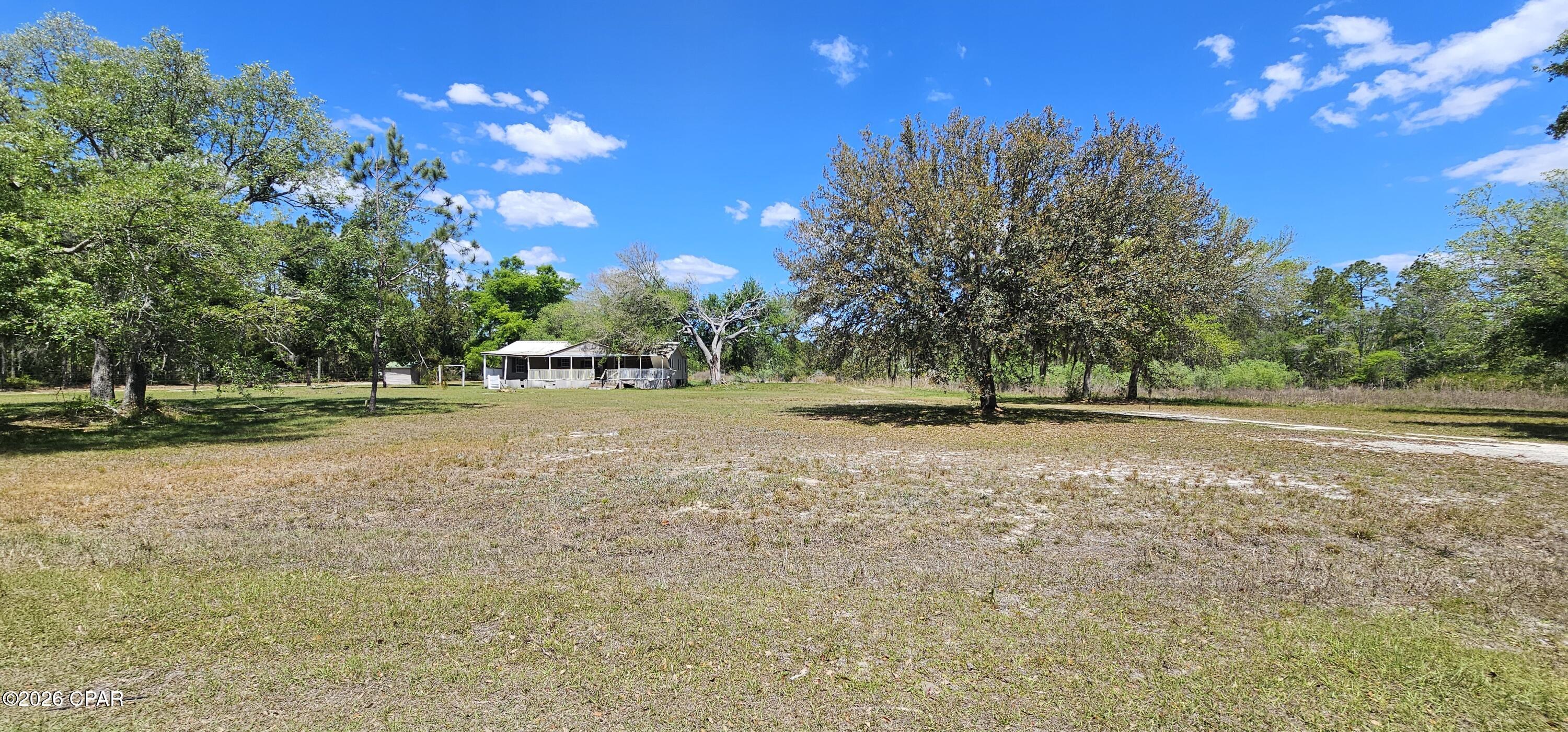 Are you searching for the perfect Florida getaway? Look no further than this beautiful 5-acre parcel located in Perry. This property offers endless potential, with plenty of space to create your ideal retreat--whether you choose to build your dream home or place a new mobile home for a relaxing weekend escape or summer residence. (There is an old mobile home on the property that has no value.)

Imagine adding a scenic deck overlooking the pond, creating a peaceful outdoor living space with a truly serene view--perfect for unwinding or entertaining guests.

Nestled in an area rich with history and charm, Perry is known as the ''Nature Coast'' and the Tree Capital of the South, offering the best of country living with convenient access to the Gulf of America. Just 10 minutes away, Keaton Beach provides the ultimate coastal lifestyle--enjoy boating, kayaking, scalloping, and soaking up the Florida sunshine in a tranquil, laid-back setting.

With its prime location and the promise of peaceful coastal country living, this property is a rare opportunity to own your own slice of paradise. So call today for more information!