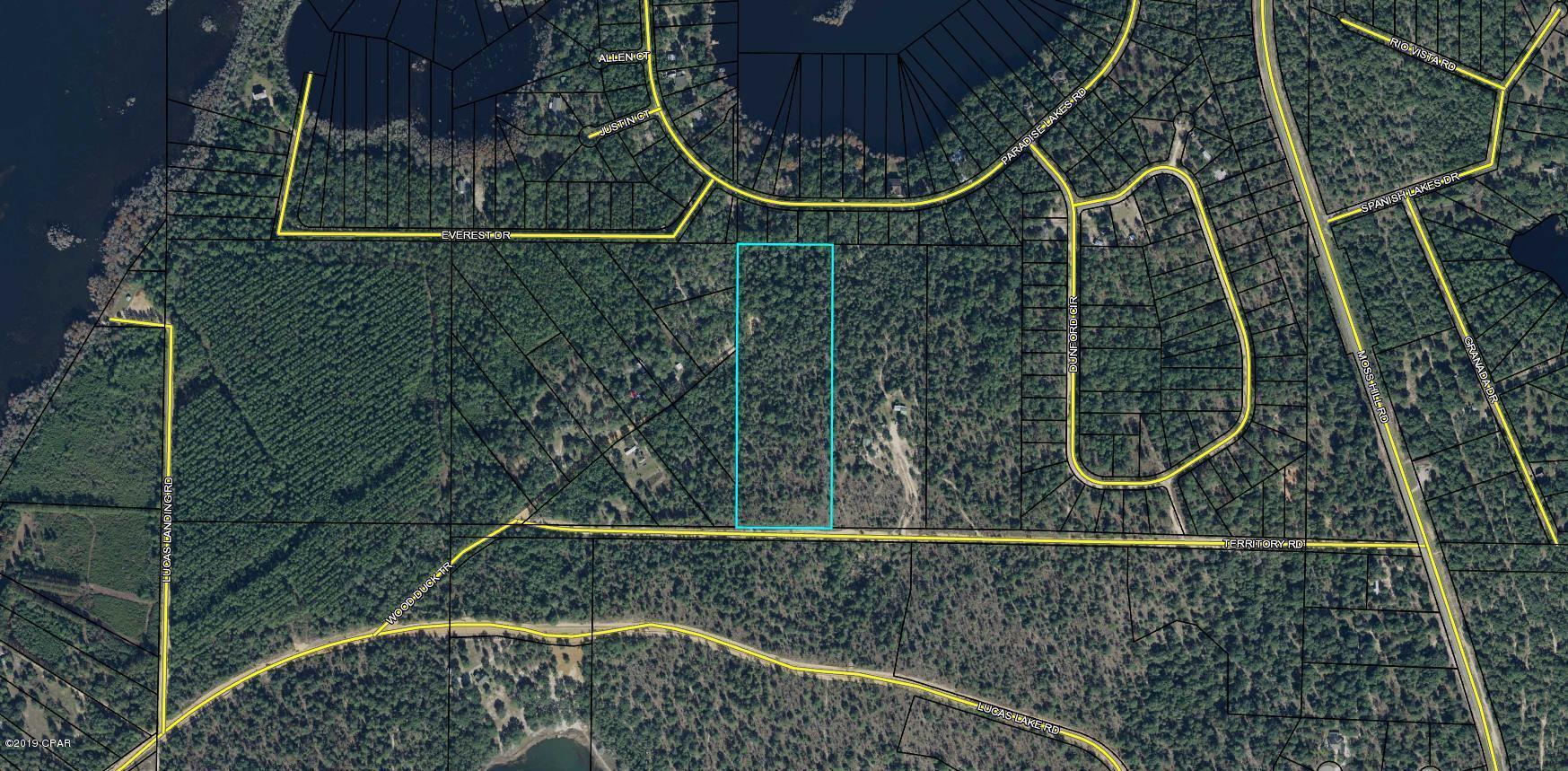 Plenty of room to stretch out with this 13 AC wooded parcel with hilltop views.  No restrictions with several large lakes within a hop n skip for water time activities.  Close to Vernon Schools and short and easy drive to town or the Beaches.  Take a look we won't mind, need more details, let us know.