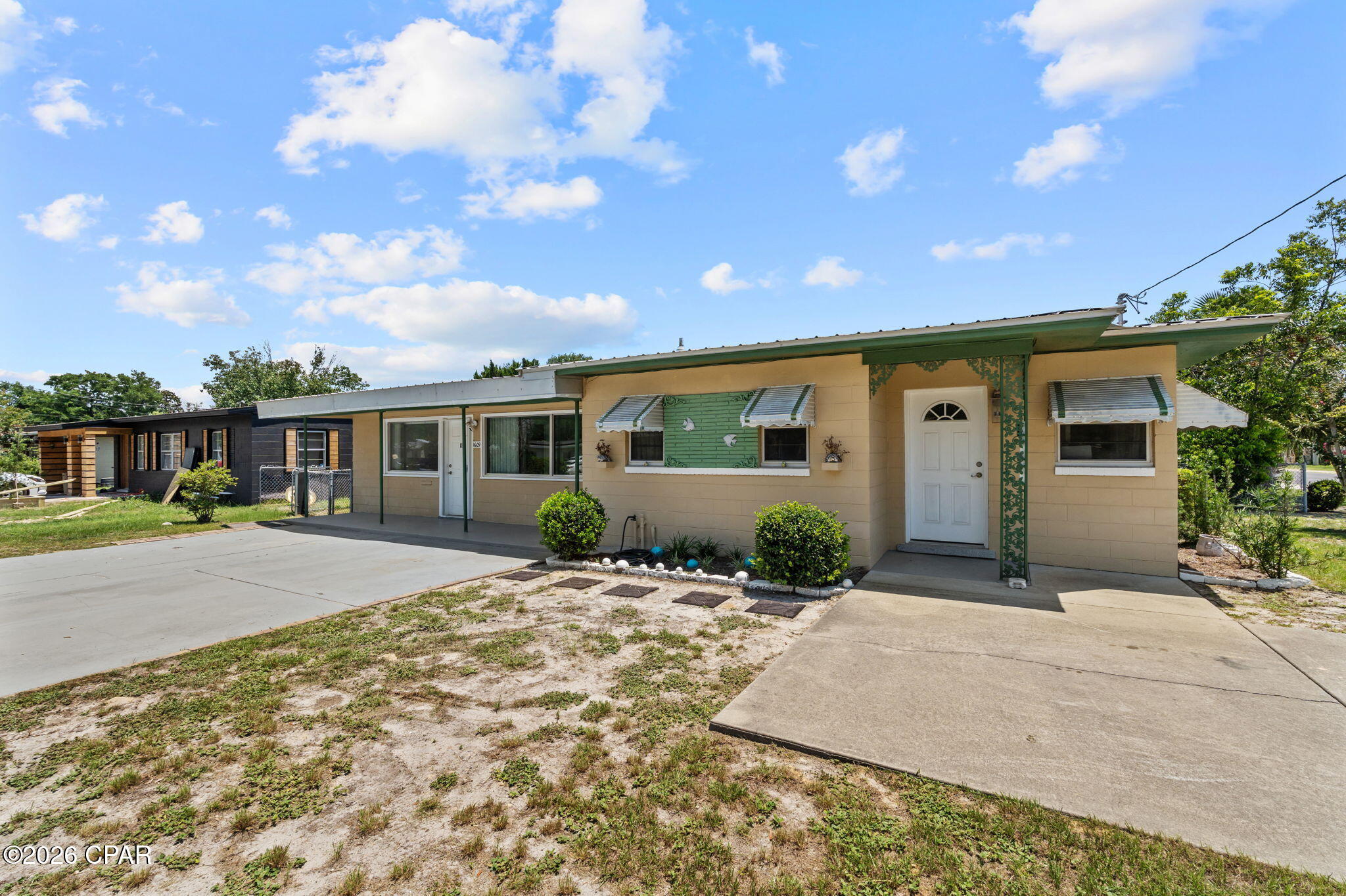 PRIME CORNER LOT • UPDATED SYSTEMS • INVESTOR FRIENDLY.   Welcome to this exceptional corner-lot property ideally located just minutes from Historic St. Andrews, St. Andrews Bay, Downtown Panama City, shopping, dining, parks, and top-rated schools.
Offering over 1,500 square feet of well-maintained living space, this move-in-ready home combines flexibility, location, and income-producing potential. Featuring two separate entrances, ample parking, and a versatile floor plan, the possibilities are endless for homeowners, investors, or those seeking additional space to customize.
Recent improvements include a NEW A/C system, NEW water heater, remodeled kitchen, metal roof, and durable concrete block construction. The home's flexible layout offers opportunities for a home office, bonus room, guest space, or potential additional bedroom.
Situated on a fully fenced corner lot, this property stands out as an excellent option for primary residence, vacation home, short-term rental, or long-term investment property. With no HOA restrictions and both short-term and long-term rentals allowed, this is a rare opportunity to maximize value in one of Panama City's most convenient locations.
Whether you're searching for your next home or your next investment, this property offers the perfect combination of comfort, flexibility, and location.
Don't miss your chance to own a property with unlimited potential just moments from the water, Historic St. Andrews, and everything Panama City has to offer!