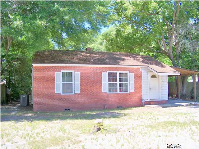 A must see investment property located in the heart of historical St. Andrews. The property is within walking distance of Oakland Terrace Park, Lake Caroline and St. Andrews Marina. Just a short drive away, you will find the Bay County Library and Bay County Government Center, as well as shopping and dining and entertainment. The home is a two bedroom one bath brick home, with a huge screened porch that looks over the shady completely fenced back yard. There is also covered parking and a cute little building which houses your washer and dryer and is great for storing all your toys. Don't delay in making your appointment to see this Fannie Mae Homepath property today. All measurements, sizes and ages are approximate, please verify if important.