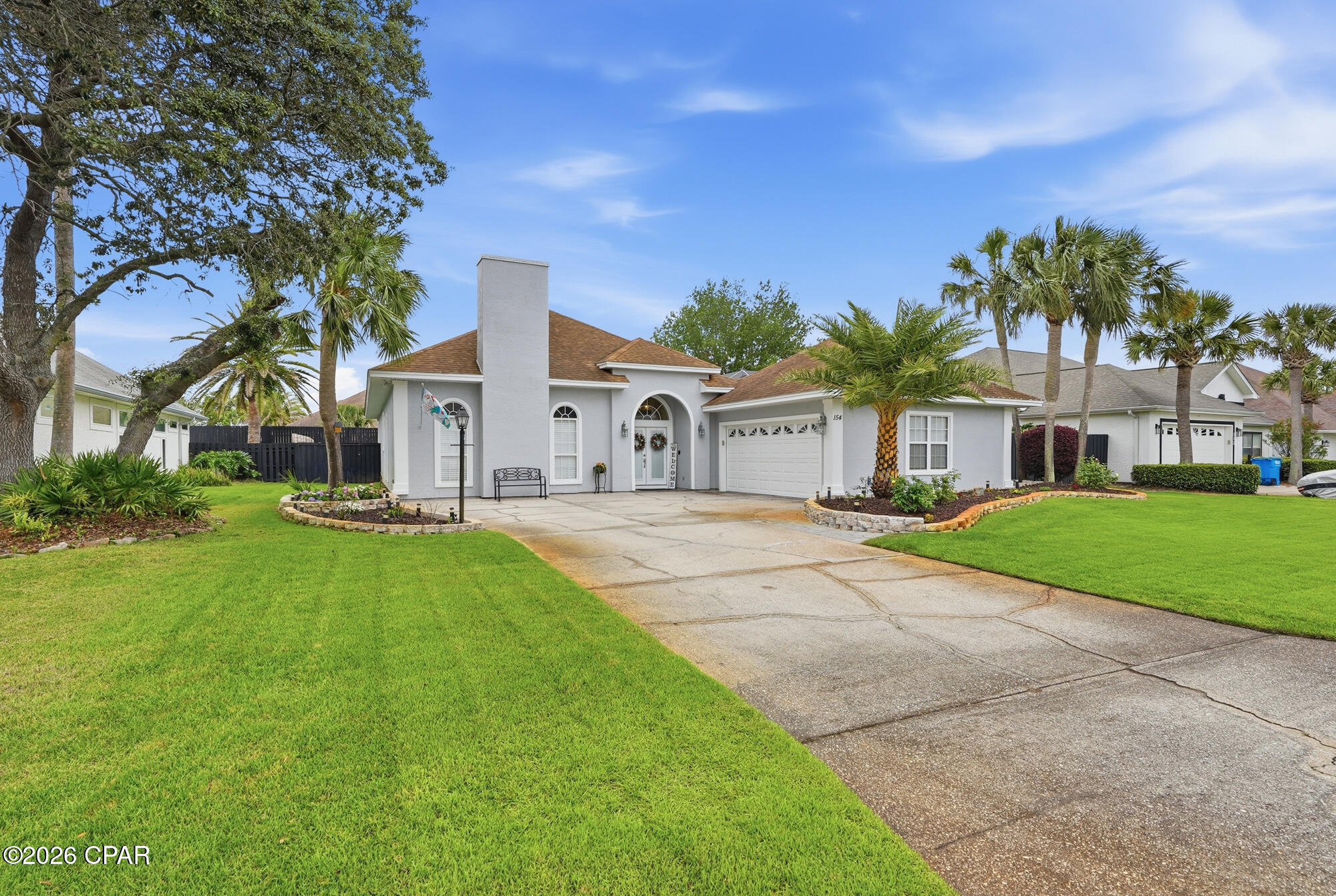 Welcome to this beautifully updated 3-bedroom, 2-bath pool home in the highly desirable Palm Bay community, just minutes from the beach. Designed for both comfort and entertaining, this home features an open-concept floor plan with 10-foot ceilings, crown molding, abundant natural light, and thoughtful upgrades throughout.

The spacious living room showcases hardwood flooring, an electric fireplace, and built-in surround sound, flowing seamlessly into the formal dining area accented by elegant columns. The gourmet kitchen is sure to impress with granite countertops, stainless steel appliances, a pantry, glass-front cabinetry, and a breakfast bar. Adjacent to the kitchen, the breakfast nook and wet bar overlook the sparkling pool, creating the perfect space for casual dining and gatherings.

The private primary suite offers a true retreat with its own electric fireplace, a spa-inspired bath featuring custom cabinetry, double vanities, an oversized tile shower with a jetted soaking tub, and a generous 10x10 walk-in closet.

Step outside to enjoy the covered lanai and newly resurfaced inground pool, all within the privacy of a fully fenced backyard--ideal for relaxing, entertaining, or enjoying Florida's beautiful weather year-round.

Recent improvements include a new HVAC system, pool pump and filter, updated electrical and lighting fixtures, and numerous additional upgrades. This move-in-ready home combines luxury, convenience, and location in one exceptional package. Schedule your private showing today!