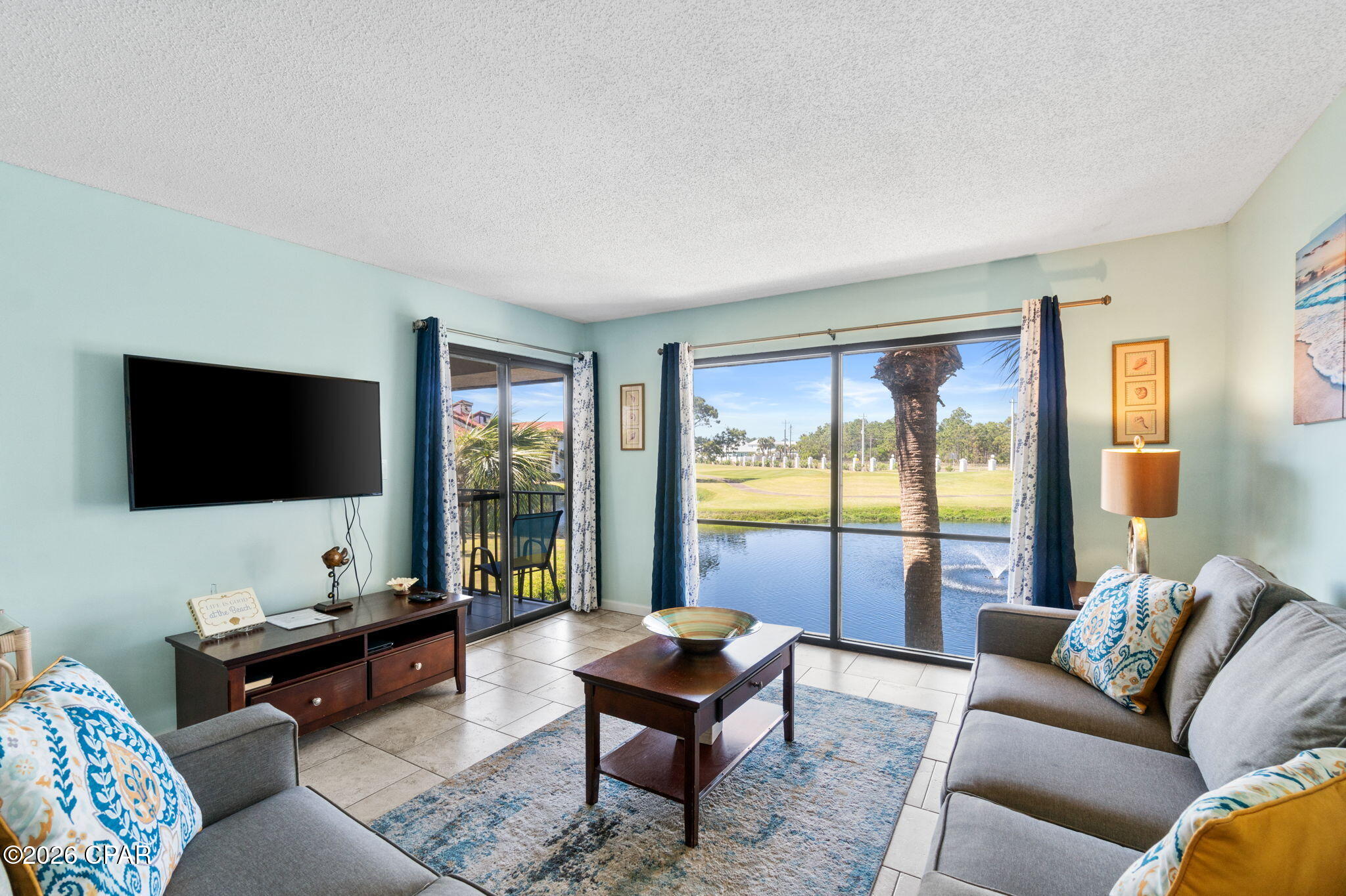 Welcome to Edgewater Golf Villas #1808 in beautiful Panama City Beach! This well maintained 2 bed / 2 bath condo has 1254 sqft of living space. It's located on the 2nd floor overlooking the pond & water fountain. There are also views of hole #4 of the Executive Par 3 - Golf Course. Recent updates include the guest bath with a new vanity & tiled shower and new tile flooring on both balconies. Edgewater offers some of the BEST amenities in Panama City Beach: 11 Pools (10 heated seasonally), Kids' Splash Pad, Fitness Center, Executive Par-3 Golf Course, Tennis Courts, Shuffleboard Courts, Pickleball Courts, On-Site Restaurant & Market plus so much more! Schedule your showing today!