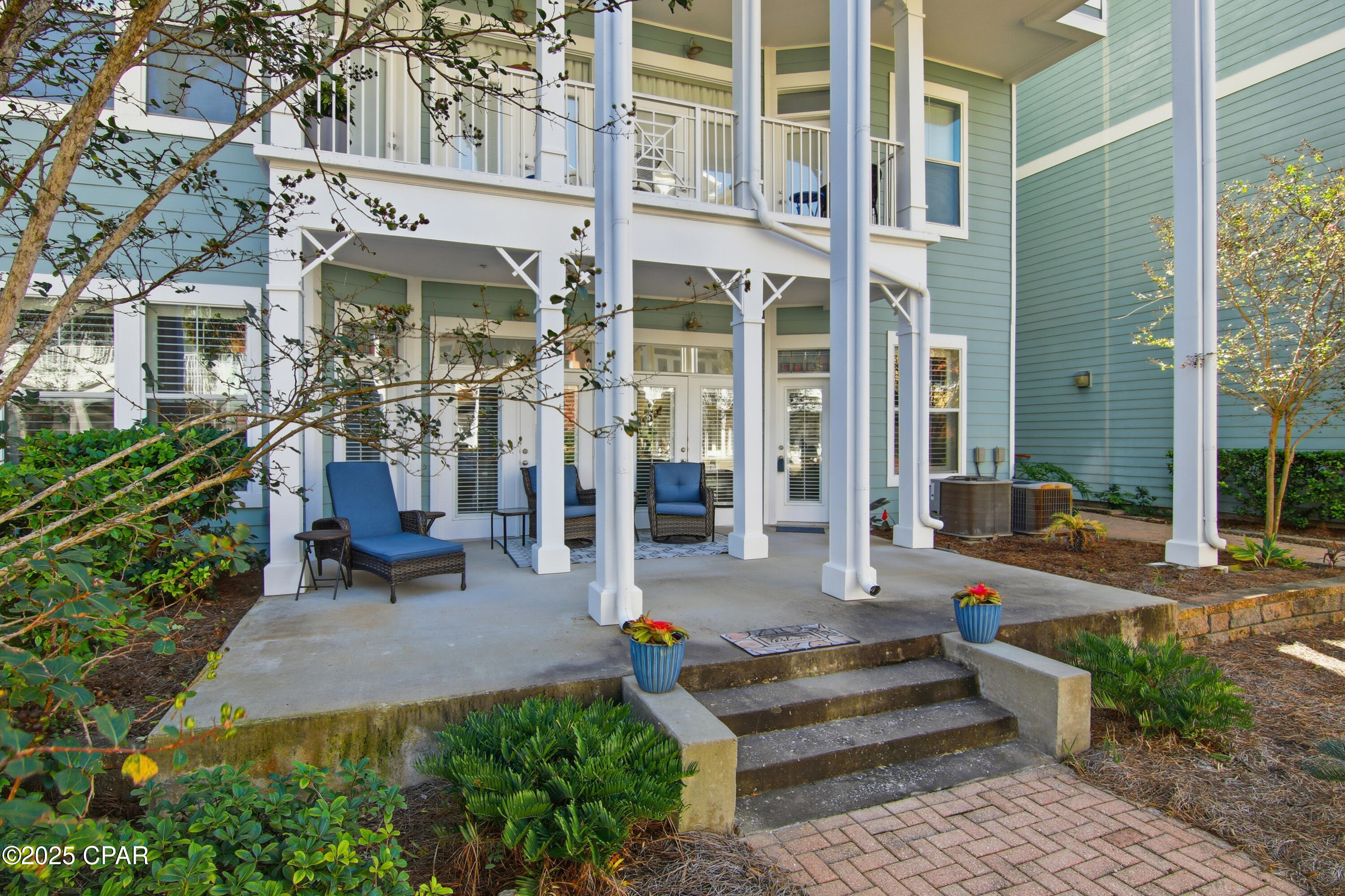 BRAND NEW HVAC SYSTEM INSTALLED JUNE, 2026.  Water heater 2019.  Ground floor unit steps to the pool and covered parking.  Island Reserve is a gated community located in the heart of Panama City Beach.  This 2BR/2.5BA unit offers two spacious ensuite primary bedrooms overlooking the lush courtyard and waterfall.  10' ceilings, crown molding, plantation shutters, walk-in closets plus soaking tub.  Granite countertops, stainless appliances, designer backsplash too.  Island Reserve is a lovely gated community with lush landscaping, lagoon-style pool, hot tub, indoor basketball, pickleball, gym, theatre room, and game room with pool tables.  Call today for your private showing!  5 minutes to the beach, fine restaurants, attractions, a short drive to Grand Lagoon, the state park and Shell Island!