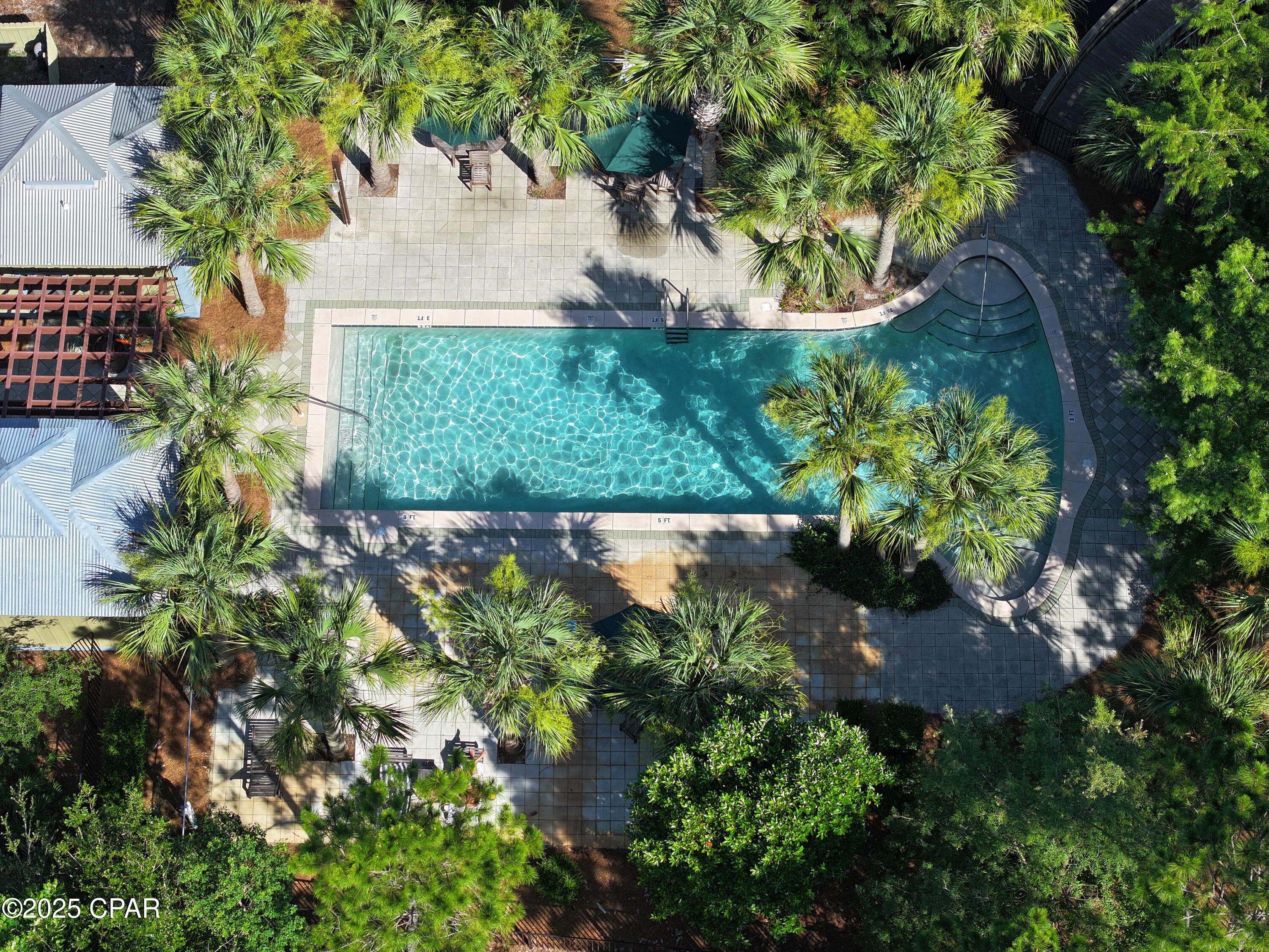 Build your dream home on a distinguished waterfront lot overlooking a peaceful pond enhanced by a beautiful, cascading fountain. Located in the highly sought-after gated community of Martinique, this property offers an exceptional lifestyle surrounded by natural beauty and upscale amenities.

Residents of Martinique enjoy picturesque walking trails, natural paths, a large community pool, park pavilion and gazebo, basketball court, and children's playground—all within a setting known for its lush landscaping and tranquil ambiance.

Ideally located just minutes from the stunning beaches, St. Andrews State Park, and local dining and shopping, this property offers the perfect blend of relaxation, convenience, and coastal charm.

Don't miss this opportunity to build your custom dream home in one of the most beautiful and desirable neighborhoods along the coast.