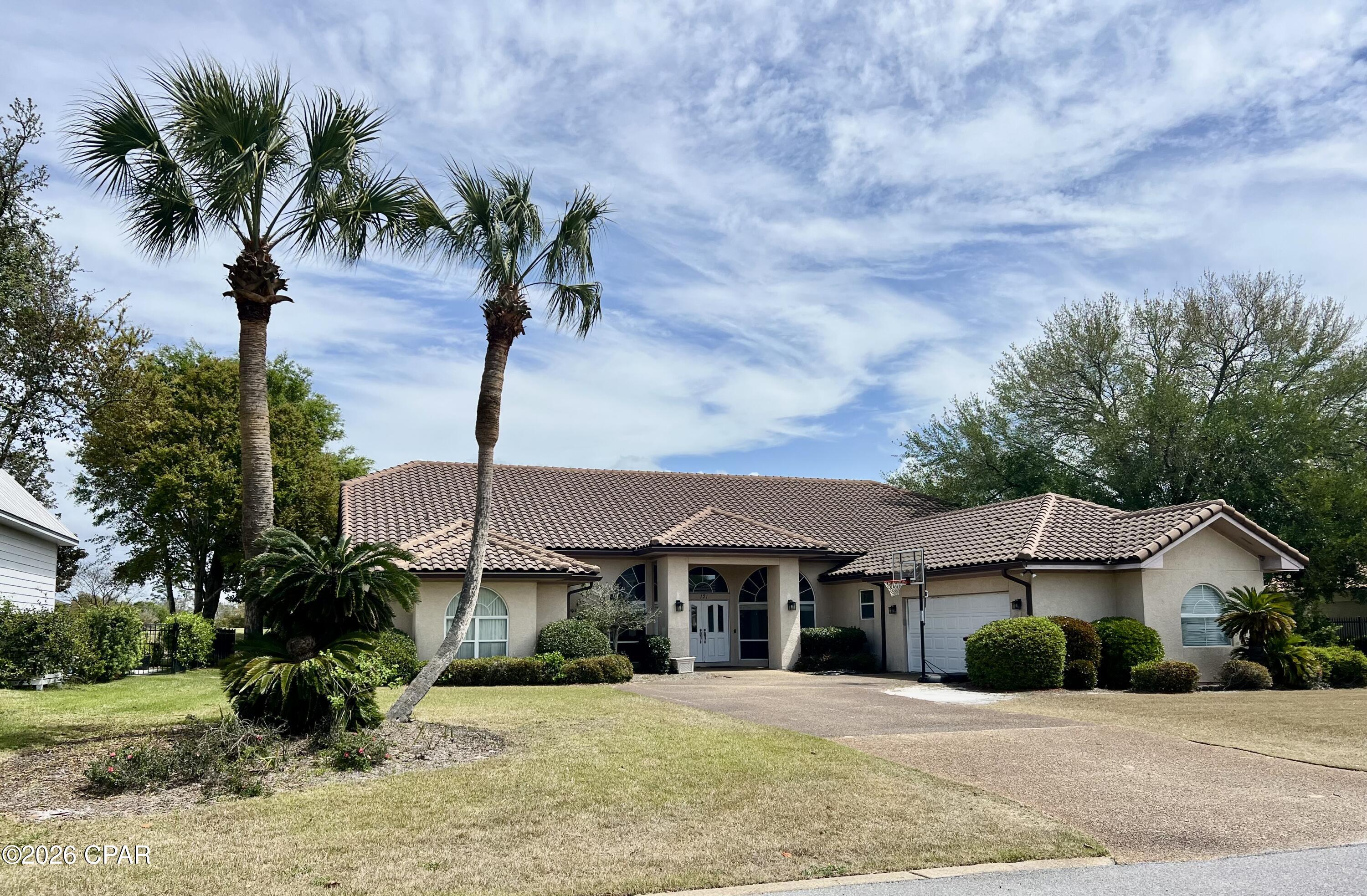 Nestled within the prestigious Dragon's Ridge neighborhood of Bay Point, this exceptional luxury home offers a rare opportunity to live along the 9th hole of the renowned Jack Nicklaus golf course. Showcasing striking Mediterranean architecture, the residence boasts impressive curb appeal, highlighted by a barrel tile roof installed in 2019 and timeless design elements throughout.

This spacious four-bedroom, three-bath home is priced to sell as is, presenting an outstanding investment or renovation opportunity to customize and create your dream home in one of the area's most sought-after communities.

Bay Point offers a vibrant and welcoming lifestyle with an array of amenities and social activities to enjoy at your leisure. Residents can take advantage of the yacht club, golf club, marina sunset socials, book clubs, wine clubs, women's club events, game nights, on-site dining, and live music. Whether you prefer an active social calendar or a more relaxed pace, Bay Point offers the perfect balance.

With over 50 years of established charm and community appeal, this is your chance to become part of one of the most desirable neighborhoods in the area.