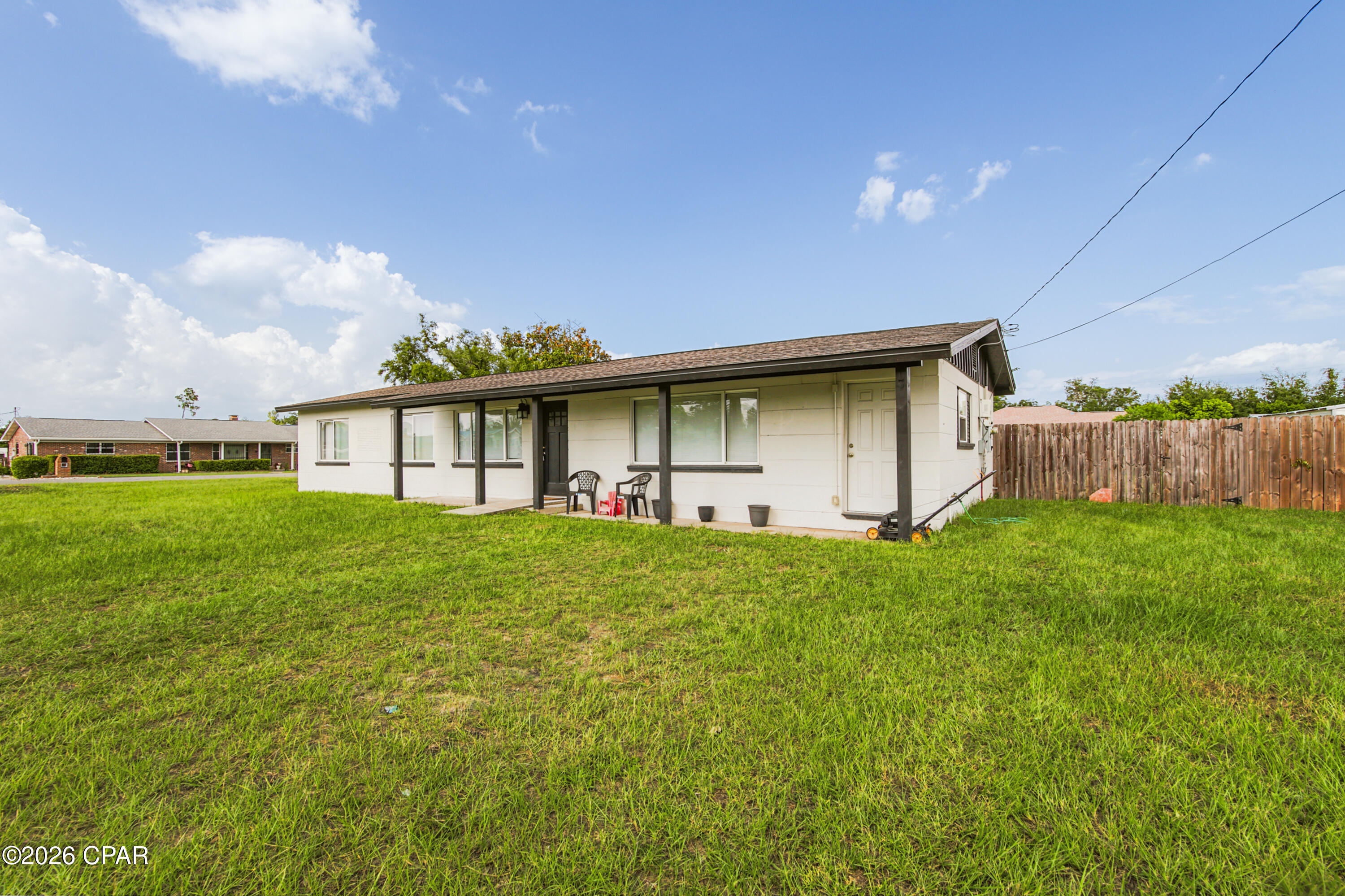 Completely Renovated 4-Bedroom Block Home on a Spacious Corner Lot with Solar Panels & No HOA

Welcome to 176 N Anita Drive, a beautifully renovated block home on a slab foundation situated on a generous 0.41-acre corner lot. This move-in-ready property offers 4 bedrooms, 2 bathrooms, modern upgrades throughout, and the freedom of no HOA.

Every major system has been updated for peace of mind, including newer plumbing, newer electrical, a newer HVAC system with updated ductwork, luxury vinyl plank flooring throughout, and a tankless hot water heater. The roof was replaced in 2019, adding even more long-term value.

The stunning kitchen is designed to impress, featuring:

Quartz countertops
Large center island with additional workspace and seating
LG stainless steel appliance package, including a gas range and InstaView touchscreen refrigerator
White shaker-style cabinetry with abundant storage
Oversized sink
Sleek black glass backsplash
Recessed lighting for a bright, modern feel

Natural light fills the home, complemented by stylish contemporary light fixtures throughout. A charming barn door leads from the kitchen into the spacious primary suite, which also offers its own private entrance from the front of the home.

The primary suite serves as a relaxing retreat with a large walk-in closet and a luxurious ensuite bathroom featuring a custom tile-to-the-ceiling walk-in shower and double vanity.

Step outside to a large, fenced backyard offering endless possibilities. With 0.41 acres, there's plenty of room to expand the home, build a workshop or detached garage, add a pool, or create the backyard paradise you've always envisioned. Whether you're entertaining, gardening, or simply enjoying the outdoors, this spacious lot provides the flexibility to make it your own. Relax and welcome guests from the expansive covered front porch, adding even more outdoor living space.

Conveniently located just 1 mile from Walmart Supercenter, shopping, restaurants, and everyday conveniences, this home is also only 12 minutes from Tyndall Air Force Base. Located in Flood Zone X, flood insurance is not required by lenders.

Additional highlights include:

Block construction on a slab foundation
Roof replaced in 2019
No HOA
Spacious 0.41-acre corner lot
Solar panels (buyer must qualify to assume the separate solar loan)
Seller has a valid survey.

This beautifully updated home combines modern style, durable block construction, thoughtful upgrades, and exceptional outdoor potential in an unbeatable location. Schedule your private showing today and discover everything 176 N Anita Drive has to offer.