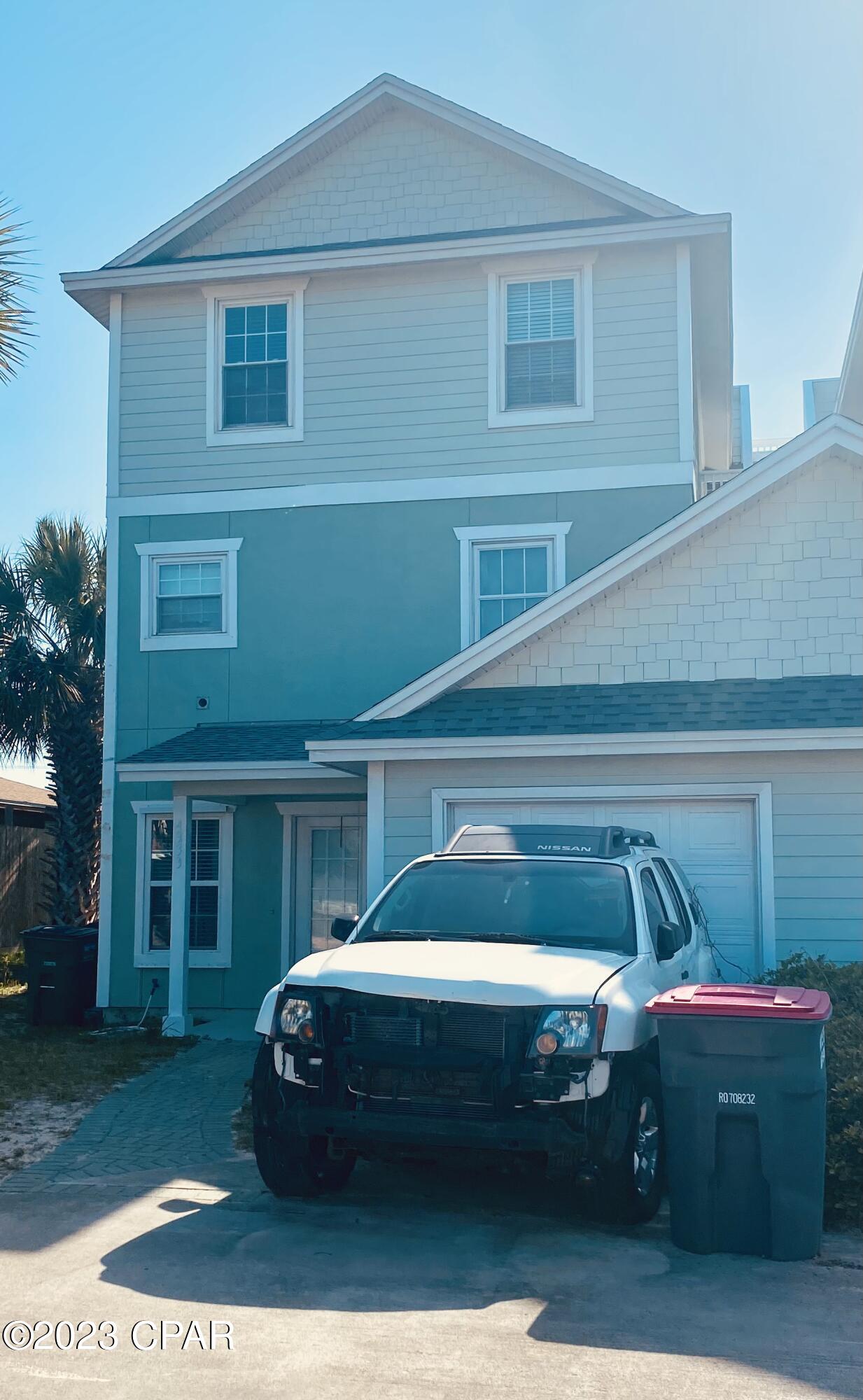 Come check out this centrally located 4-bedroom townhome only a short walk to the beach. It is perfectly setup for a short-term rental or vacation home. Home also includes an attached garage ideal for storage or a golf cart. Only minutes to Saint Andrews State Park, local restaurants, shops, and water activities.