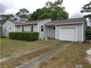 Move in ready home conveniently located close to downtown, parks, walking trails and the bay. The front part of the home has hardwood floors/ceilings extending from the formal living/dining area into the 3 bedrooms. The bathroom has been updated and the original kitchen converted to a laundry room. The back part of the home was a later edition including a full bath, large kitchen with two informal eating areas and a pool room that could be used as an informal living room. There is also a screened in porch, large two car garage/workshop and a one car garage. According to the property appraisers website, the effective year built of this home is 1985. The stainless steel appliances and washer/dryer stay with the home. Schedule your showing today to see all the potential this home offers!