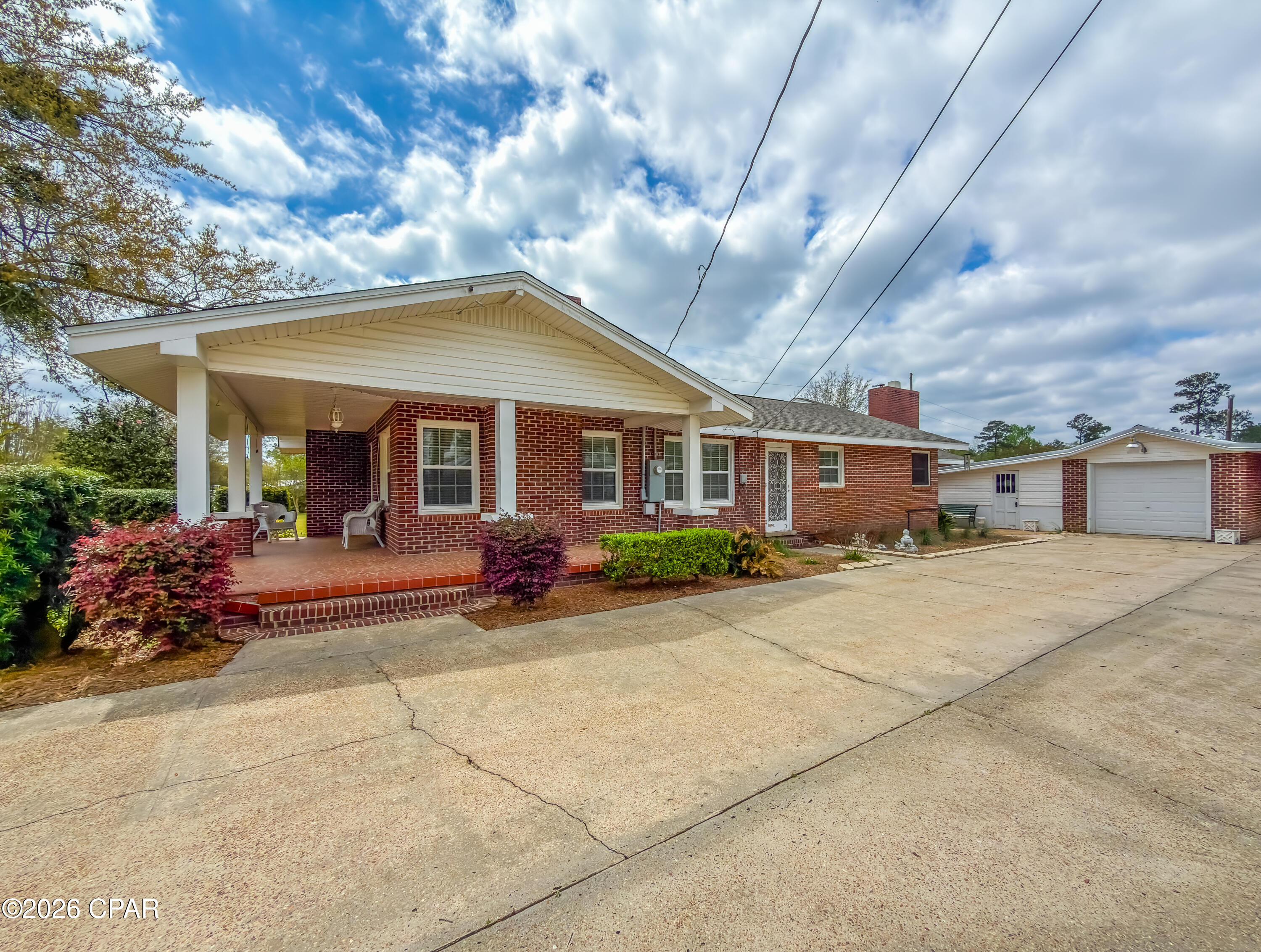 Welcome to 15870 SE Pear Street in Blountstown, FL where space, comfort, and convenience come together.

If you've been searching for a home with room to live and enjoy everyday life, this 3 bedroom, 2 bath home offers 2,410 square feet on approximately 1.8 acres inside the city limits. You get the benefit of extra space while still being close to town.

Step onto the front porch and picture starting your mornings with a cup of coffee and fresh air. Inside, the formal living room gives you a great place to gather with guests. The family room with a fireplace creates a warm setting for relaxing evenings. The Florida room adds even more space to unwind, read, or enjoy views of your property year round.

Outside, you'll have plenty of room to enjoy the land, whether that's for outdoor activities, hobbies, or simply having extra space around you. The detached one car garage and multiple carports, including two in the backyard, provide flexible options for parking and storage.

The home features a 2018 roof. You'll also enjoy being about an hour from Panama City and Mexico Beach, giving you easy access to the Florida Panhandle's coastline while still having space of your own.

Come see what makes this property a great place to call home.
