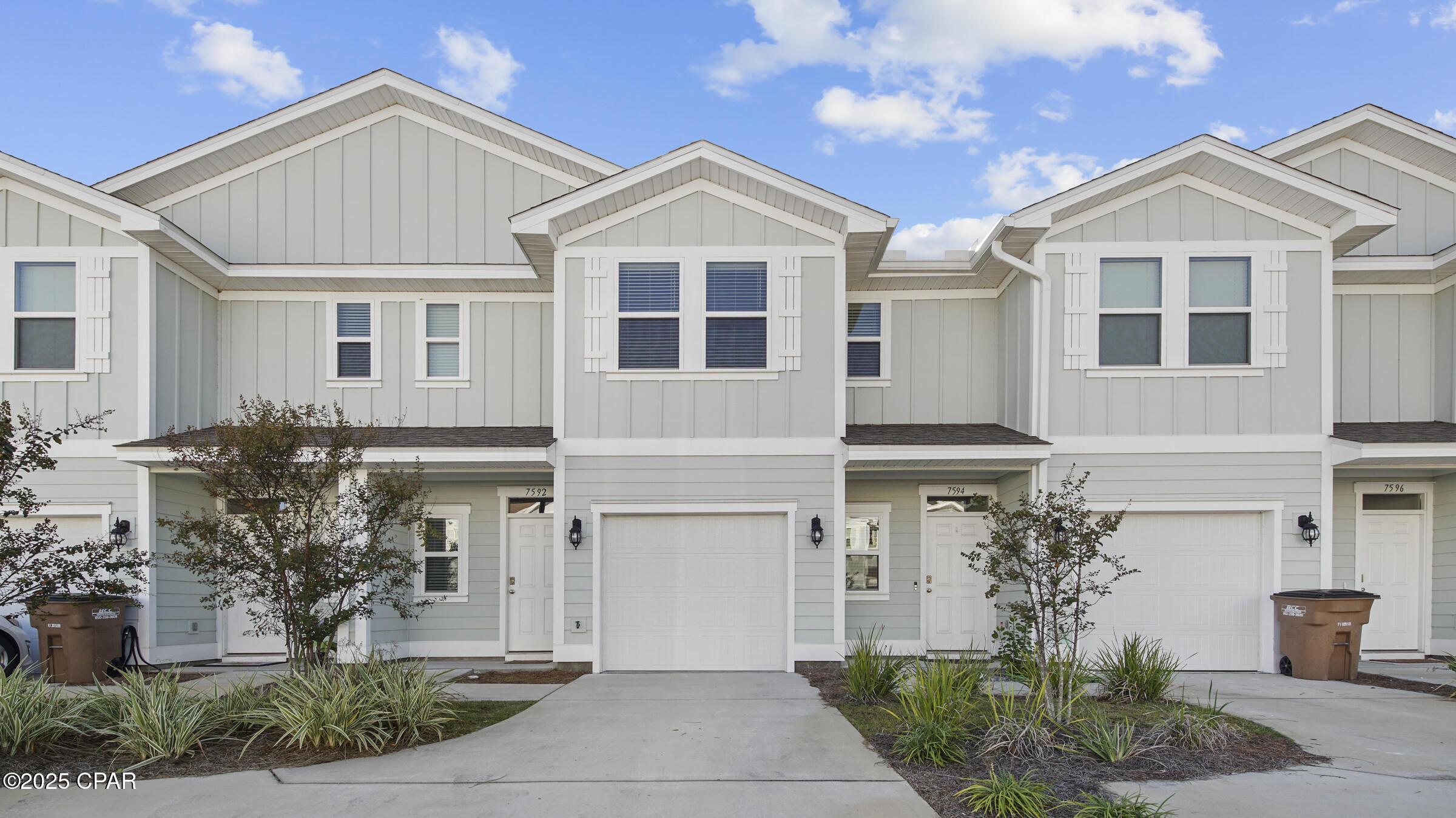 Available the first week of June! Only about 8 min to the Navy Base or Gulf State College. Take a peek at this pristine townhome in PCB. The lower level boasts a stylish kitchen with stainless steel appliances, granite countertops, a pantry, and a breakfast bar perfect for four. The spacious living area offers plenty of space for furniture and a dining table, along with a convenient half bath for guests. Upstairs, you'll find three generous bedrooms, a washer and dryer, extra storage, and two full bathrooms. The primary bedroom is grand, featuring a luxurious bathroom with a shower and double sink vanity, as well as a sizable walk-in closet. Step outside onto the wood deck overlooking a peaceful preserve. And don't forget about the community perks - it's just a stone's throw from the pool with waterfalls, handicap access, and bathrooms. With sidewalks, ponds, and a prime location near the Navy base, college, and beaches, this community has it all. Plus, trash and yard maintenance are included in the rent!