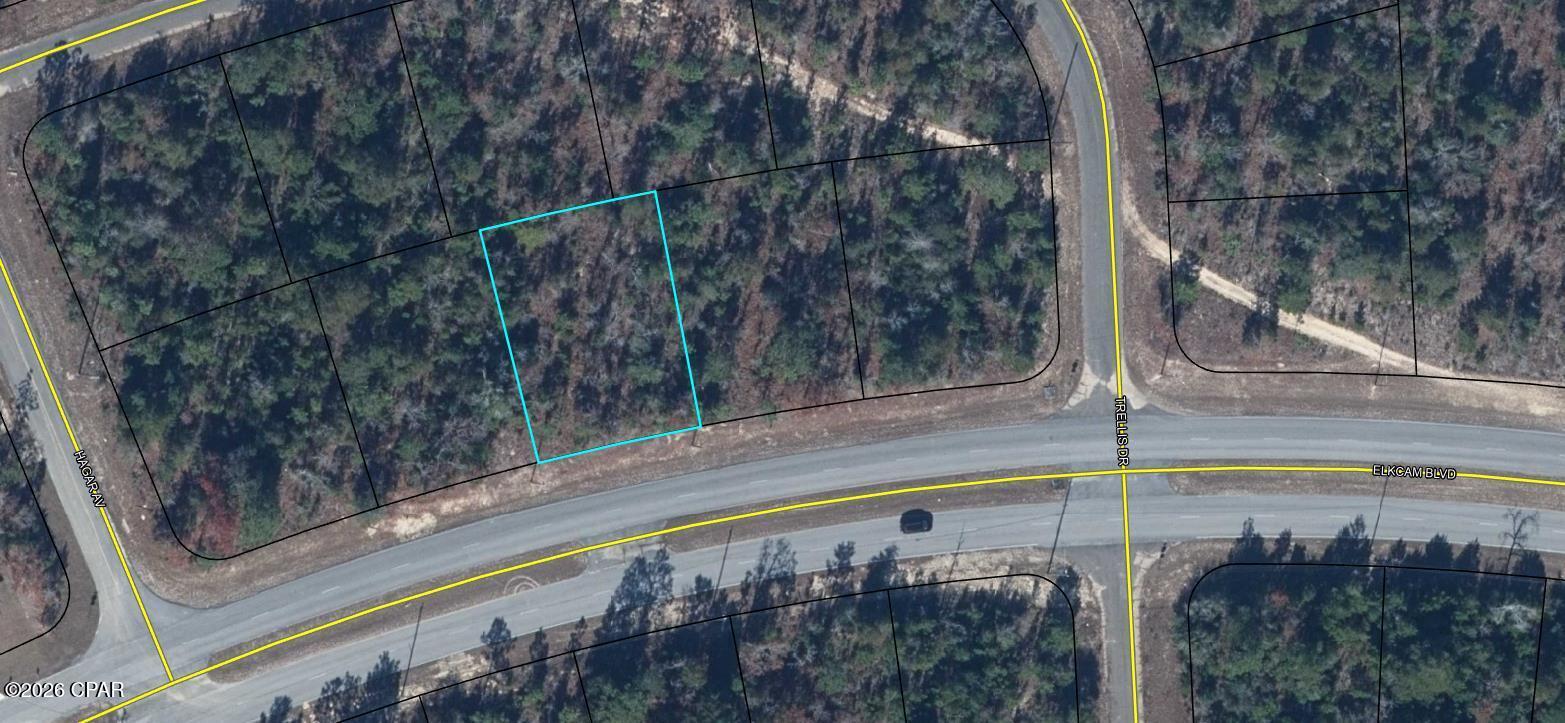 Discover the perfect opportunity to build your dream home in the desirable Sunny Hills community! This vacant lot is ideally located on Elkcam Boulevard, just off Highway 77, offering convenient access to both Chipley and Panama City. Whether you're commuting for work or heading to the beach, this central location makes it easy to enjoy the best of both worlds.

Sunny Hills is known for its scenic surroundings and outdoor lifestyle, featuring several beautiful lakes ideal for fishing, kayaking, and relaxing weekends. The community also offers a popular public golf course and a peaceful residential setting, making it a great place to call home. Don't miss your chance to own a piece of this growing area--bring your vision and start building today!