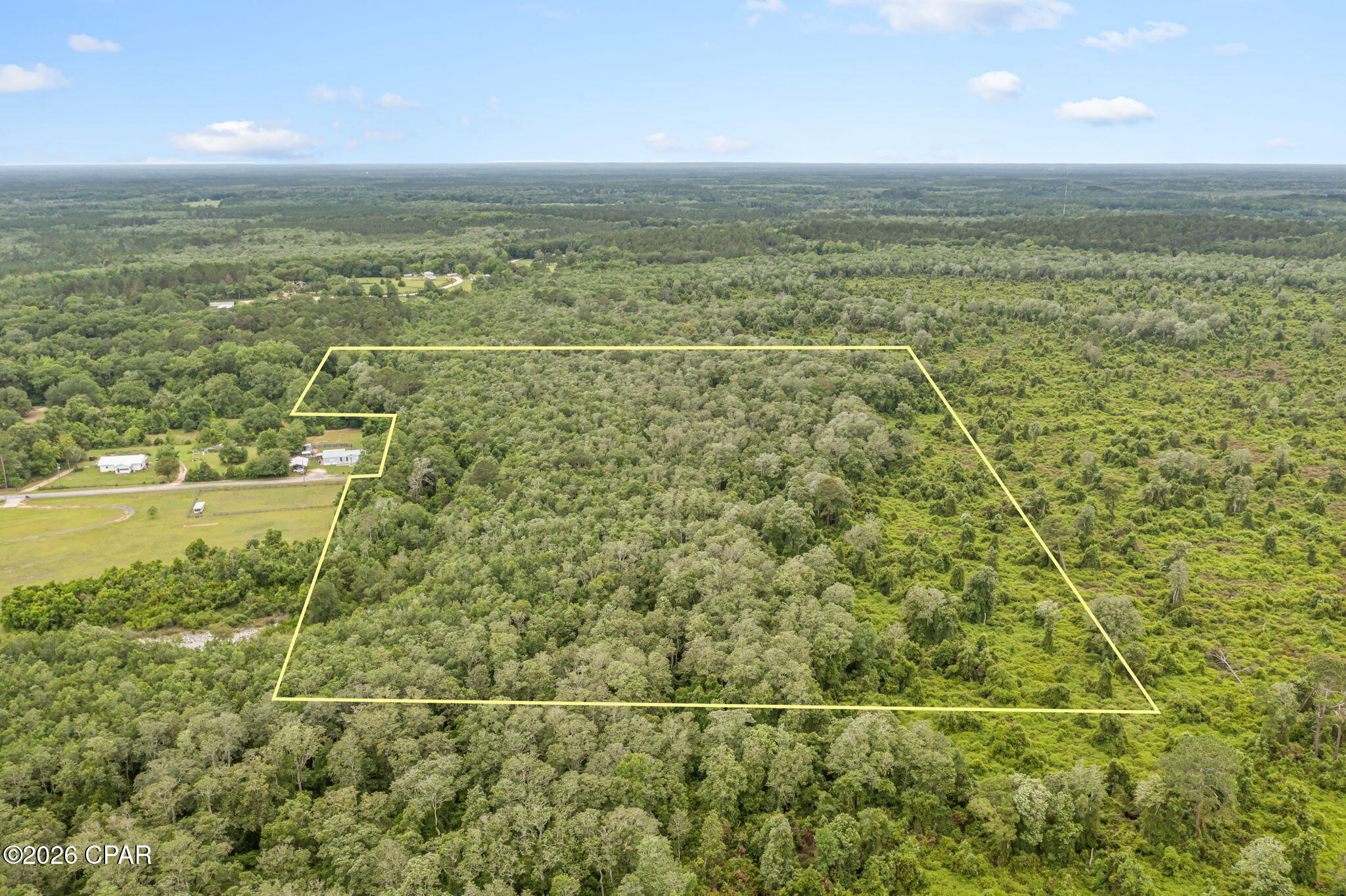 Escape to the peace and privacy of country living with this beautiful approximately 14.5+/- acre wooded tract tucked away on a dead-end street. Surrounded by mature trees and natural beauty, this property offers a quiet setting with plenty of room to build your dream home, weekend getaway, or private retreat. With a secluded feel, you'll enjoy the serenity of nature while still being conveniently located just a short drive from shopping, dining, schools, and everyday conveniences in Bonifay. Whether you're looking for a homesite, recreational property, or long-term investment, this wooded acreage offers endless potential in a peaceful rural setting. (Most of the property does appear to be in a flood zone)