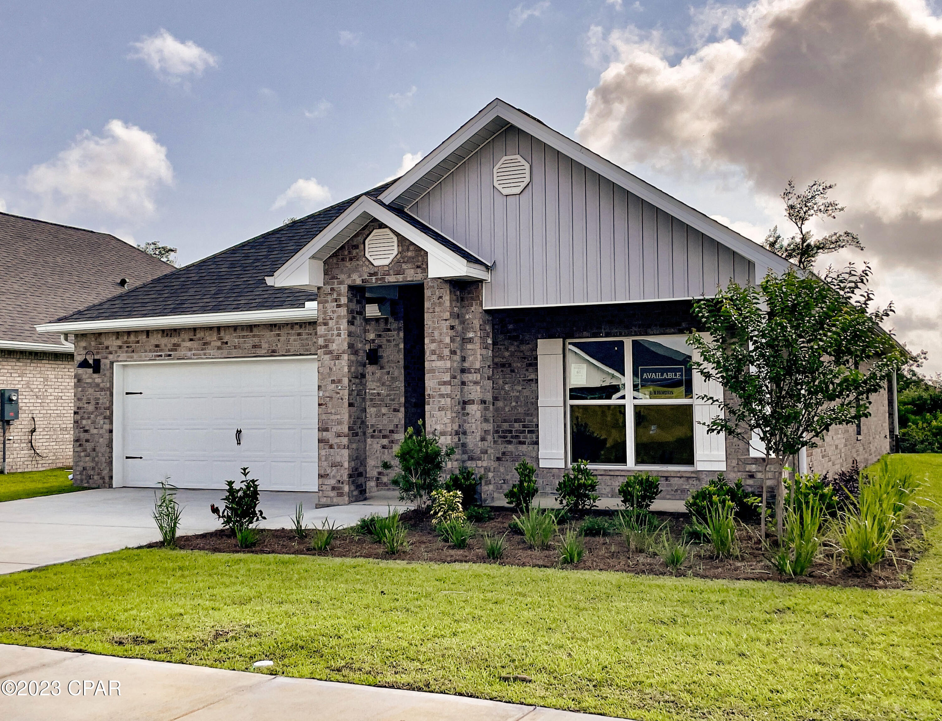 Andrews Park is centrally located off 389 in the very desirable area off Lynn Haven. Our Rhett floorplan is all brick, 4-bedroom 2-bath, it is an open concept floor plan, with a boasting 1,835 sq.ft. The Rhett floorplan has upgraded finishes throughout. You will find 9-foot ceilings with 10-foot trays and beautiful crown molding. The Rhett also has LVP flooring, granite countertops, a large kitchen island with cabinetry on both sides underneath and brushed nickel hardware. This floorplan has energy efficient windows to allow lots of beautiful natural light. The primary bathroom has a beautiful garden tub, perfect for relaxing, and a spacious walk in shower with a glass enclosure. All of these homes come with Deako lighting and Safe Haven smart home systems. Andrews Park homes feature irrigation systems with reclaimed water to help minimize your water expenses. All homes come with a landscaping and sod package as well as gutters.